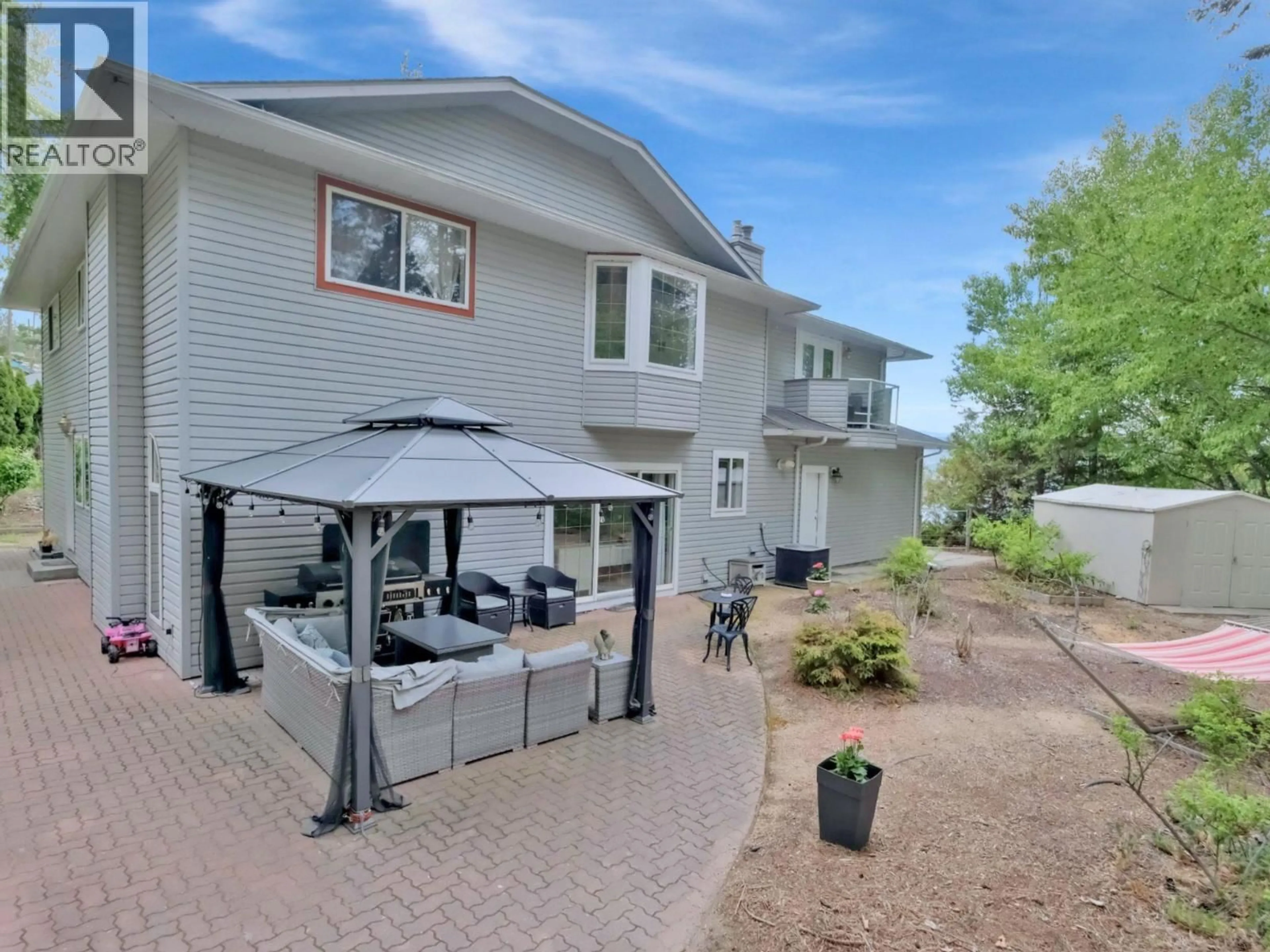 A pic from outside/outdoor area/front of a property/back of a property/a pic from drone, unknown for 3257 JUNIPER DRIVE, Naramata British Columbia V0H1N1