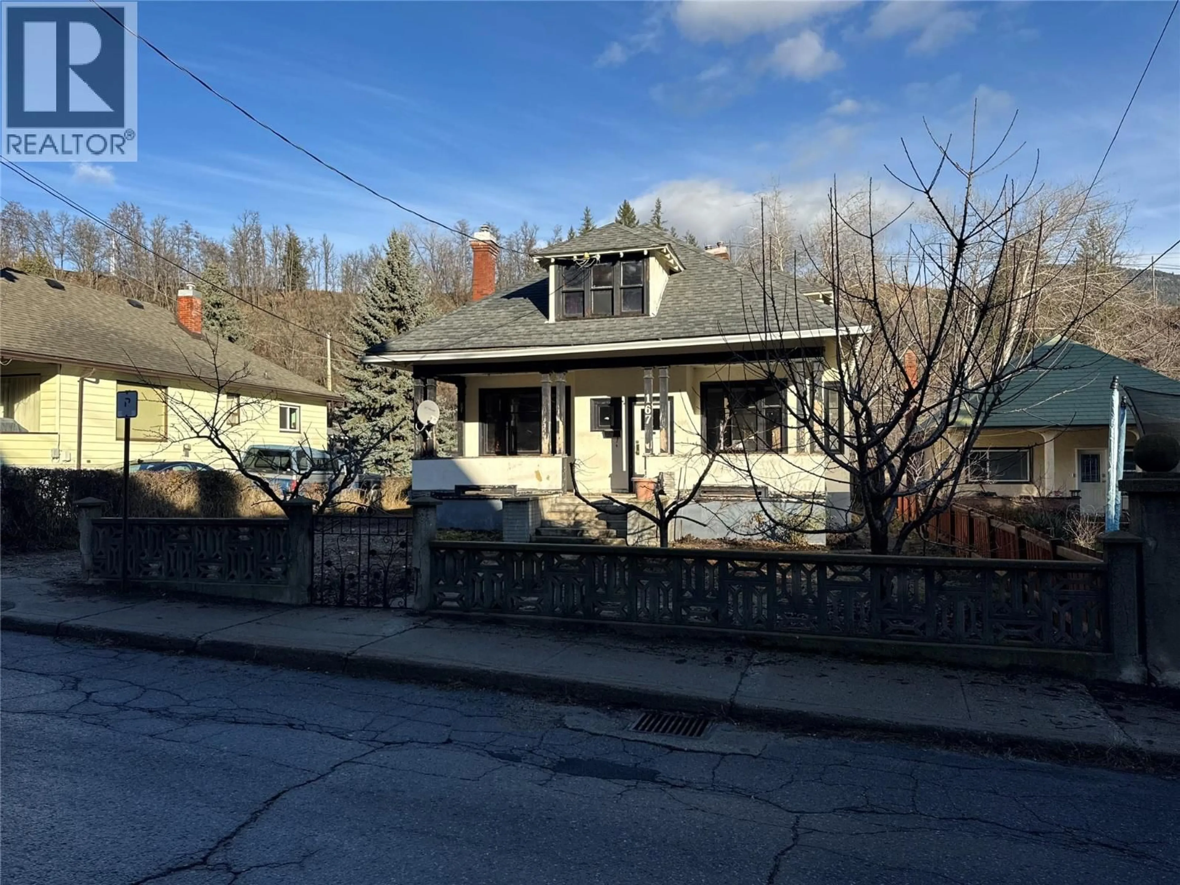 A pic from outside/outdoor area/front of a property/back of a property/a pic from drone, street for 167 OLD ROSSLAND AVENUE, Trail British Columbia V1R3M4