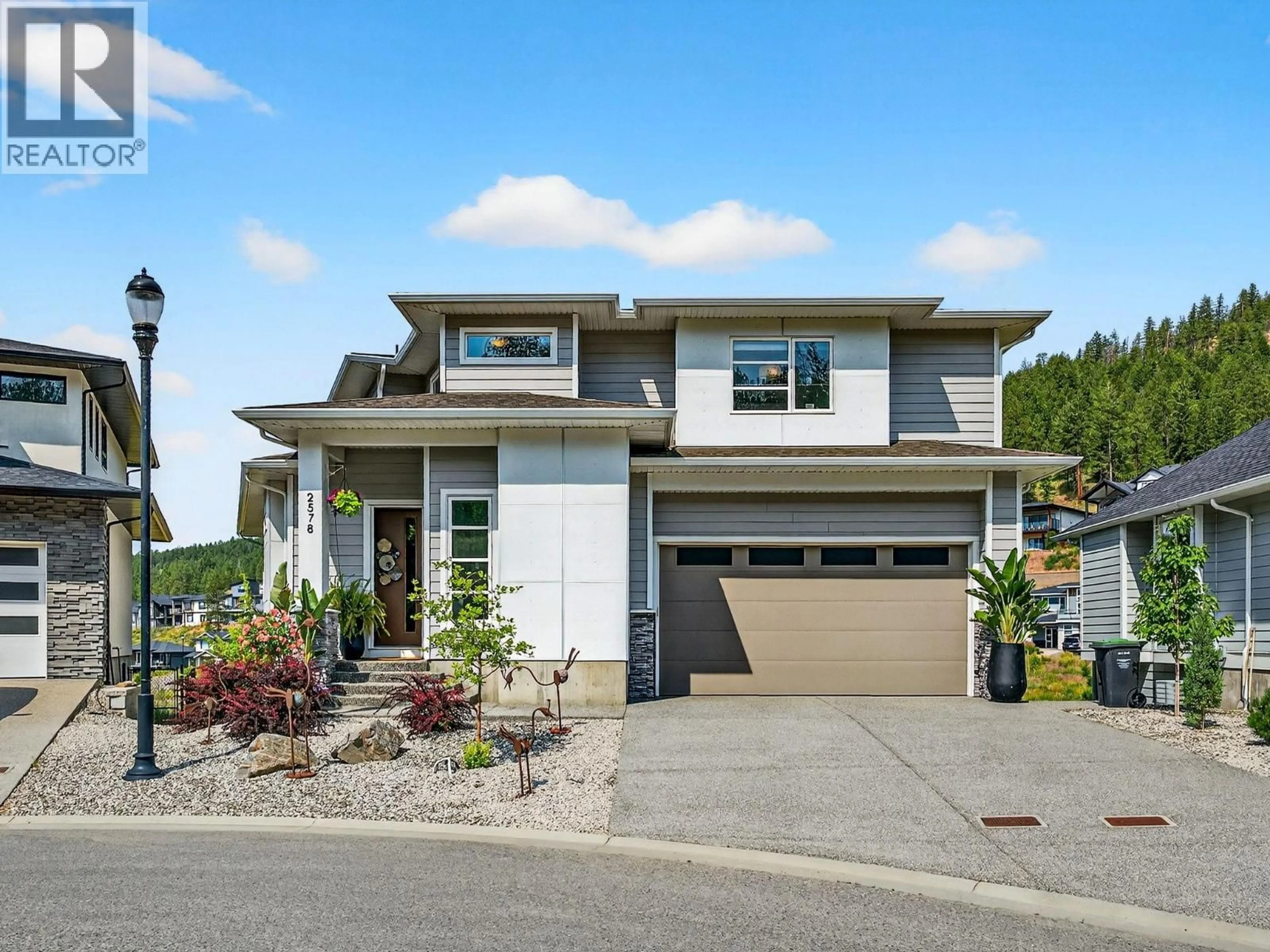 Home with vinyl exterior material, street for 2578 CROWN CREST PLACE, West Kelowna British Columbia V4T3M6