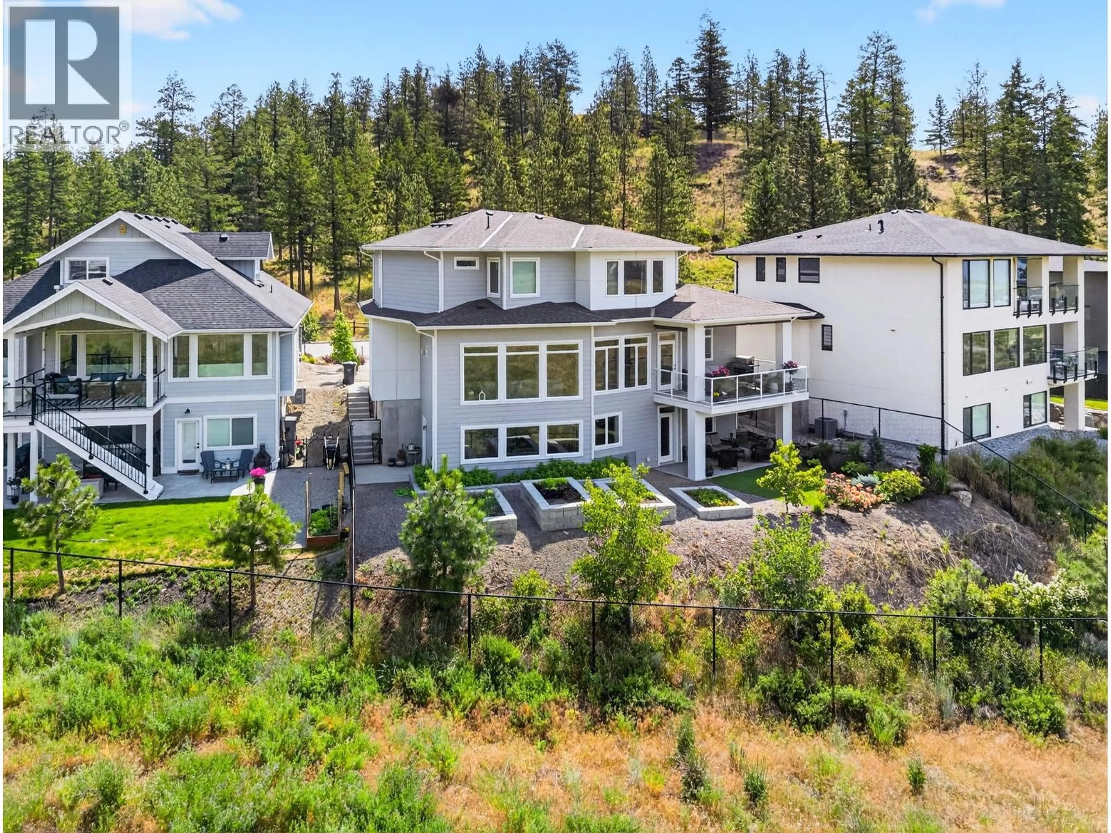 A pic from outside/outdoor area/front of a property/back of a property/a pic from drone, mountain view for 2578 CROWN CREST PLACE, West Kelowna British Columbia V4T3M6