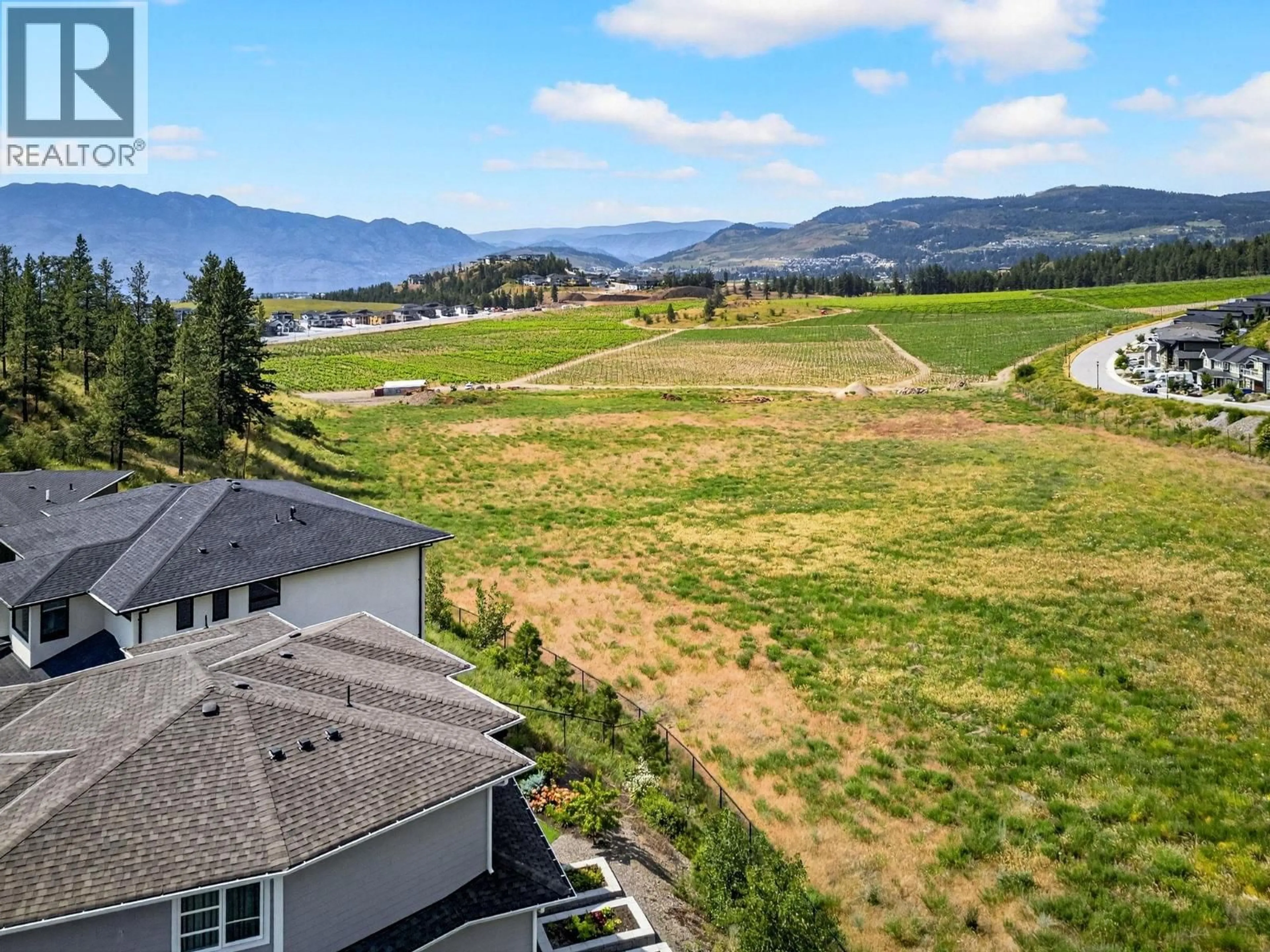 A pic from outside/outdoor area/front of a property/back of a property/a pic from drone, water/lake/river/ocean view for 2578 CROWN CREST PLACE, West Kelowna British Columbia V4T3M6