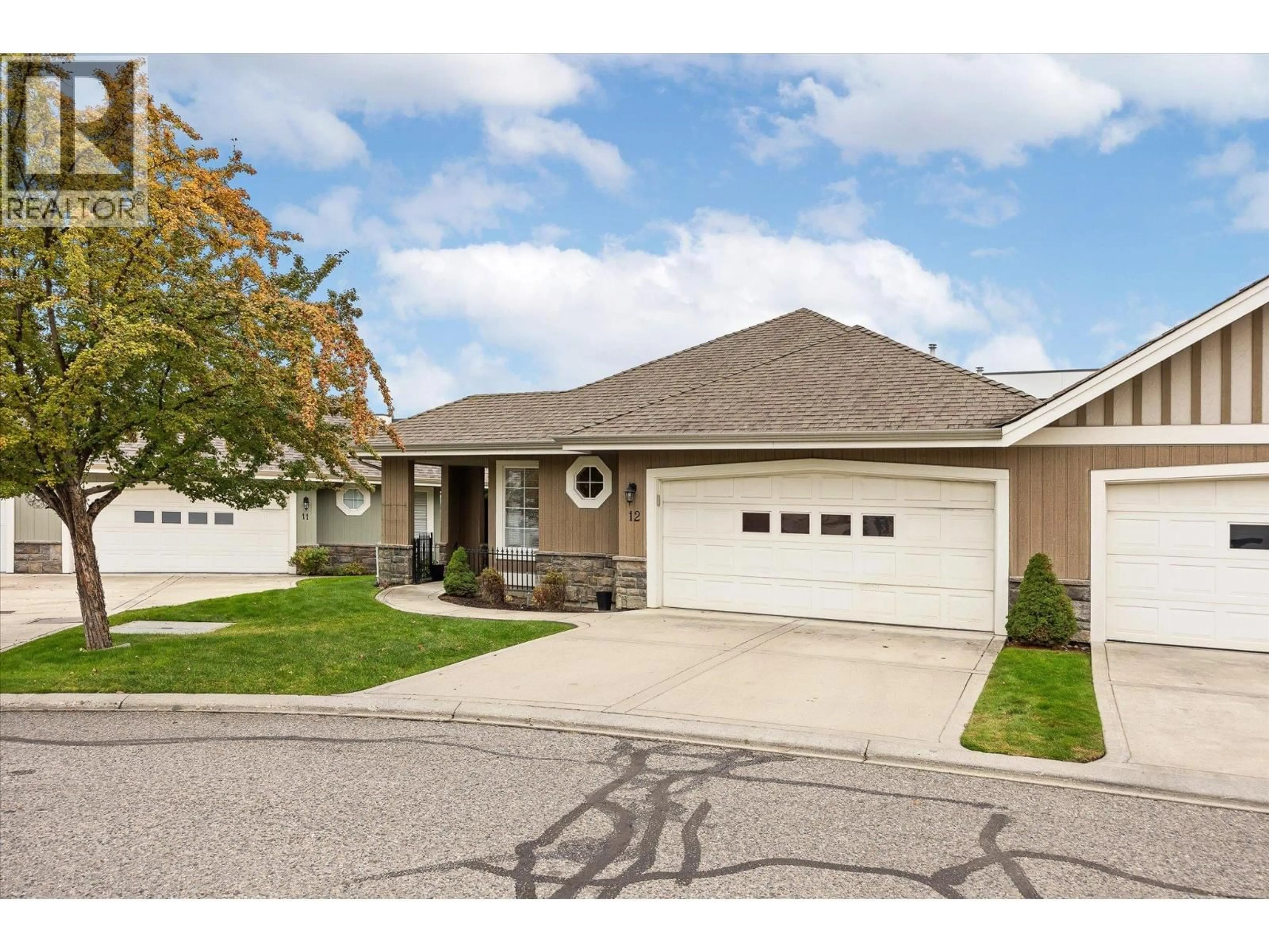 Home with vinyl exterior material, street for 12 - 680 VALLEY ROAD, Kelowna British Columbia V1V2J3