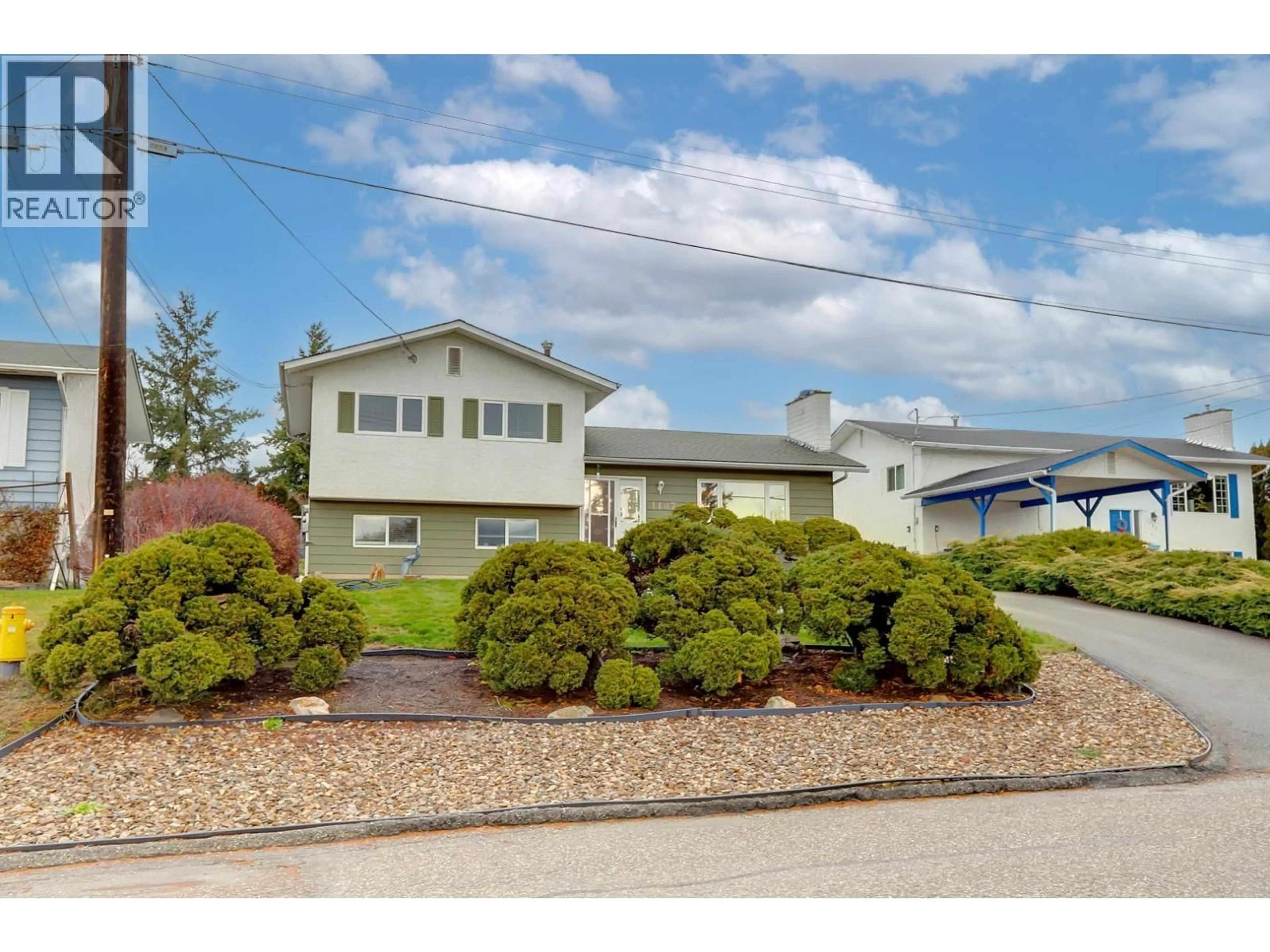 Home with vinyl exterior material, street for 1107 29 AVENUE, Vernon British Columbia V1T1Y4