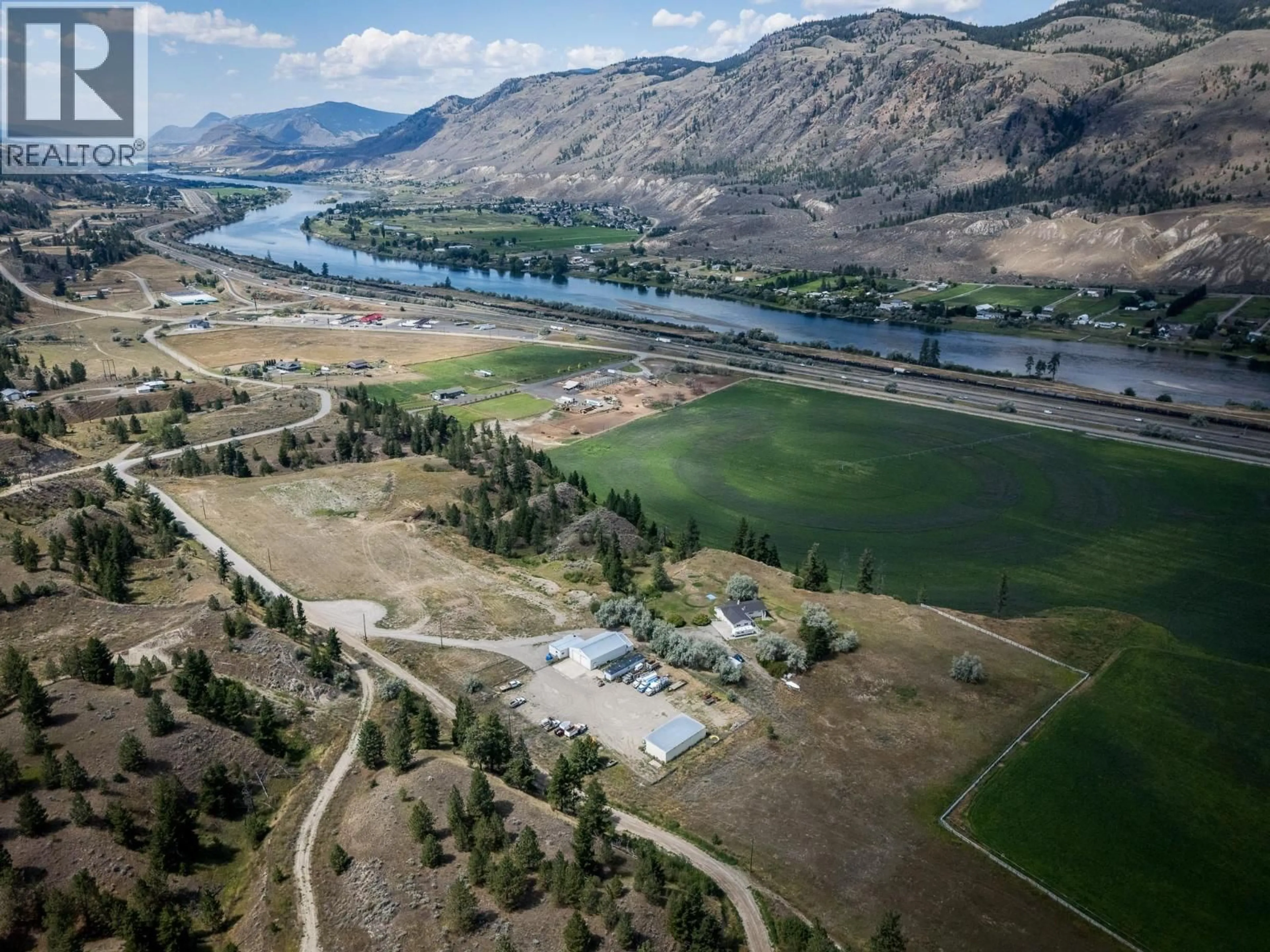 A pic from outside/outdoor area/front of a property/back of a property/a pic from drone, water/lake/river/ocean view for 1315B HOOK ROAD, Kamloops British Columbia V0E2M0