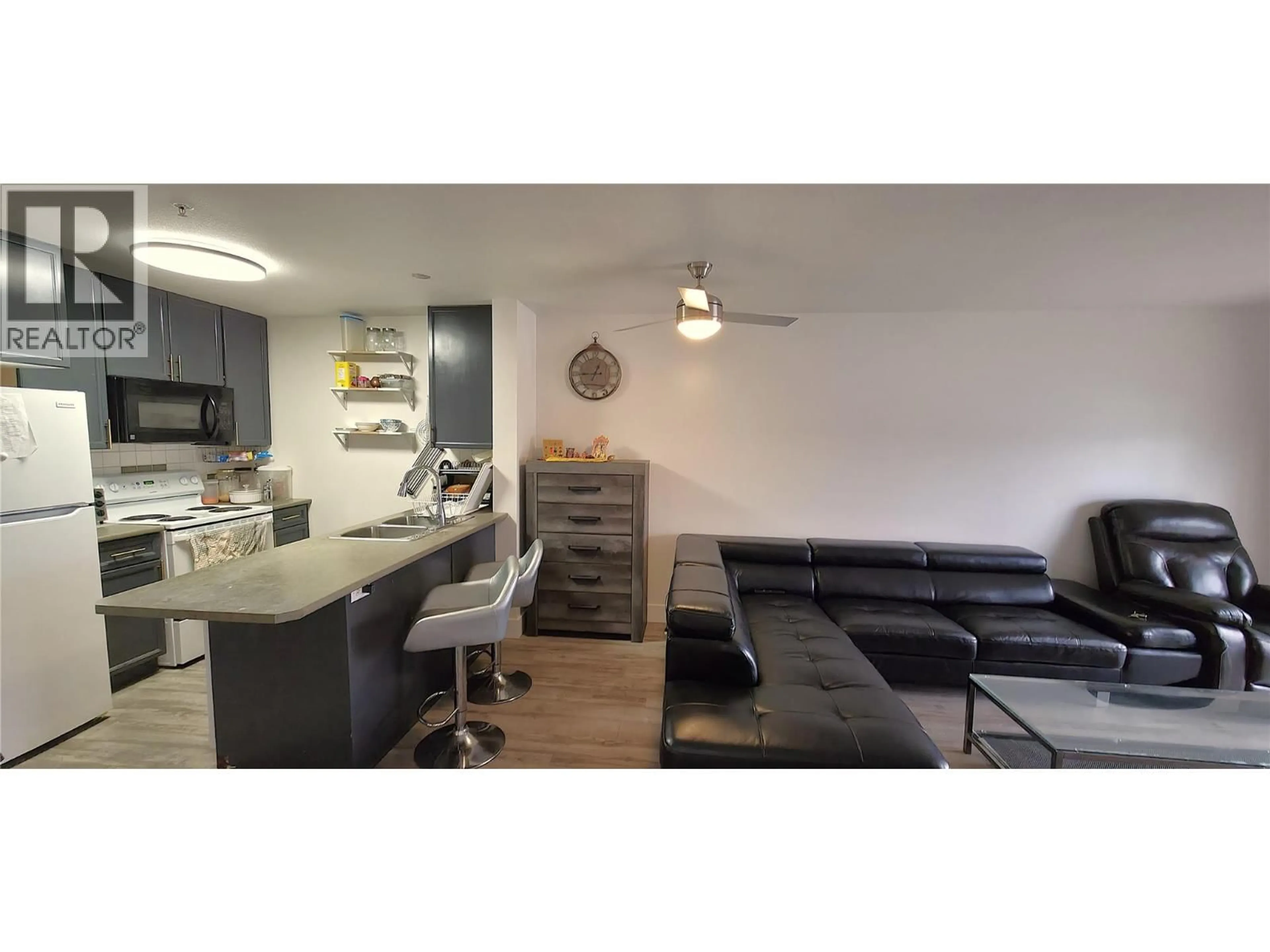 Open concept kitchen, wood/laminate floor for 206 - 256 HASTINGS AVENUE, Penticton British Columbia V2A2V6