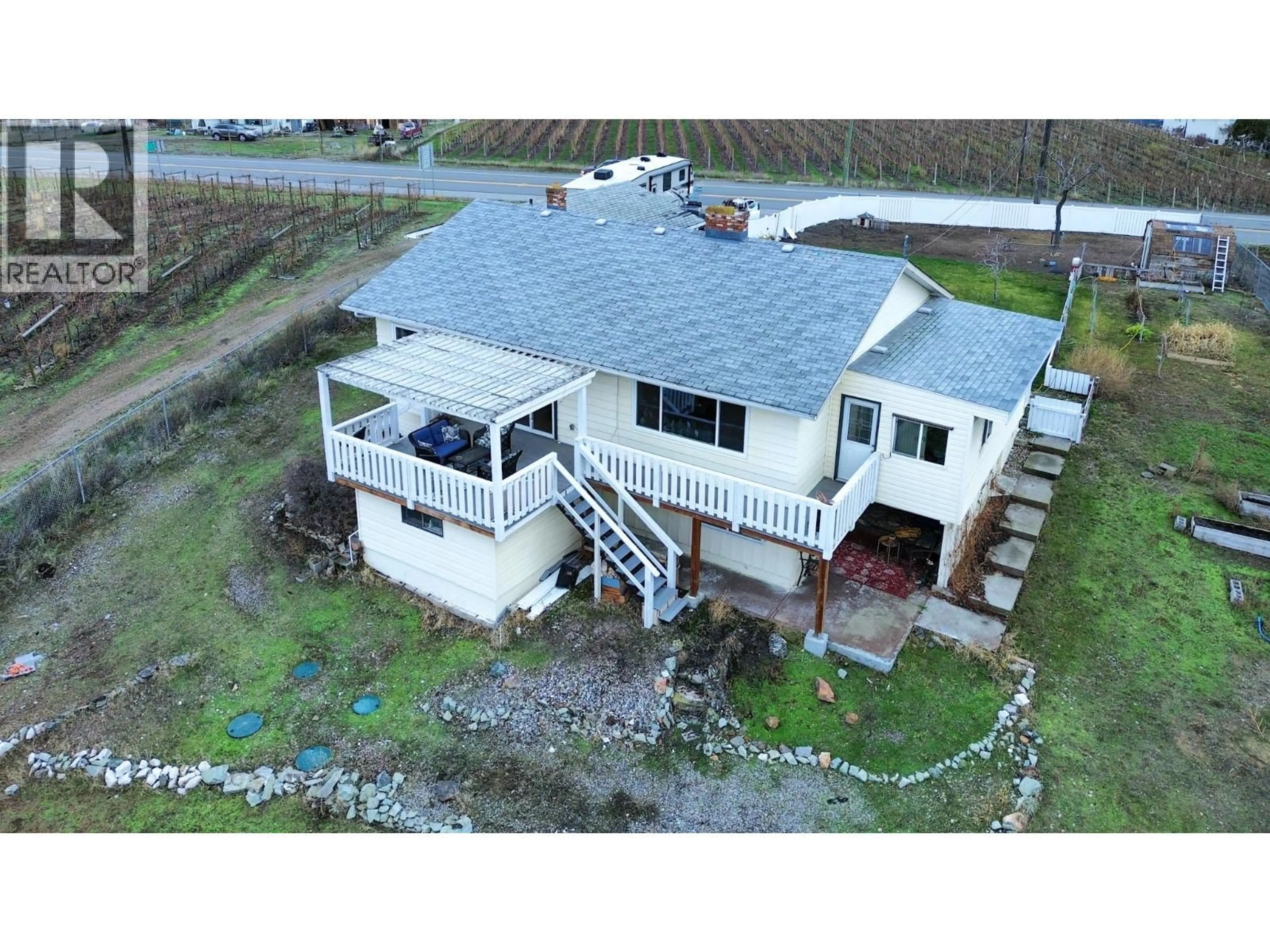 A pic from outside/outdoor area/front of a property/back of a property/a pic from drone, building for 1827 97TH STREET, Osoyoos British Columbia V0H1V1