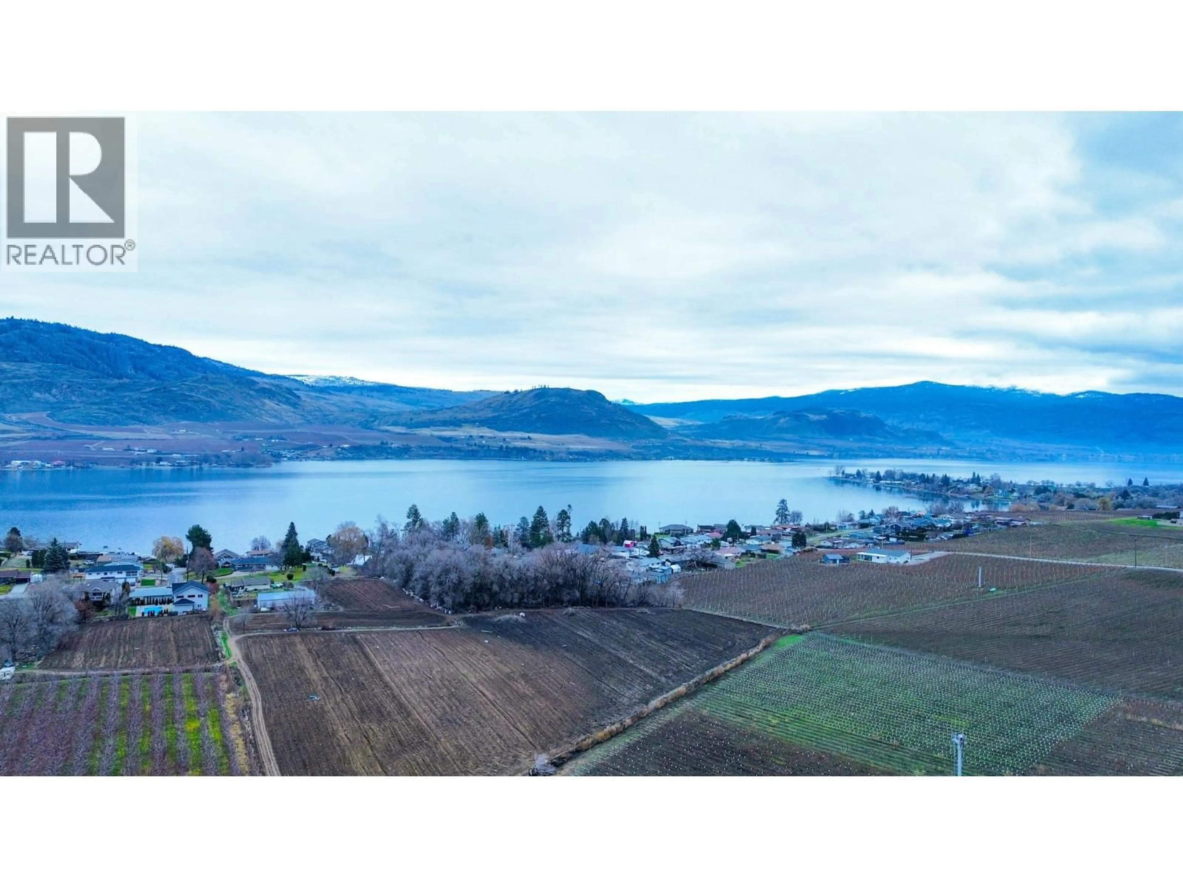 A pic from outside/outdoor area/front of a property/back of a property/a pic from drone, water/lake/river/ocean view for 1827 97TH STREET, Osoyoos British Columbia V0H1V1
