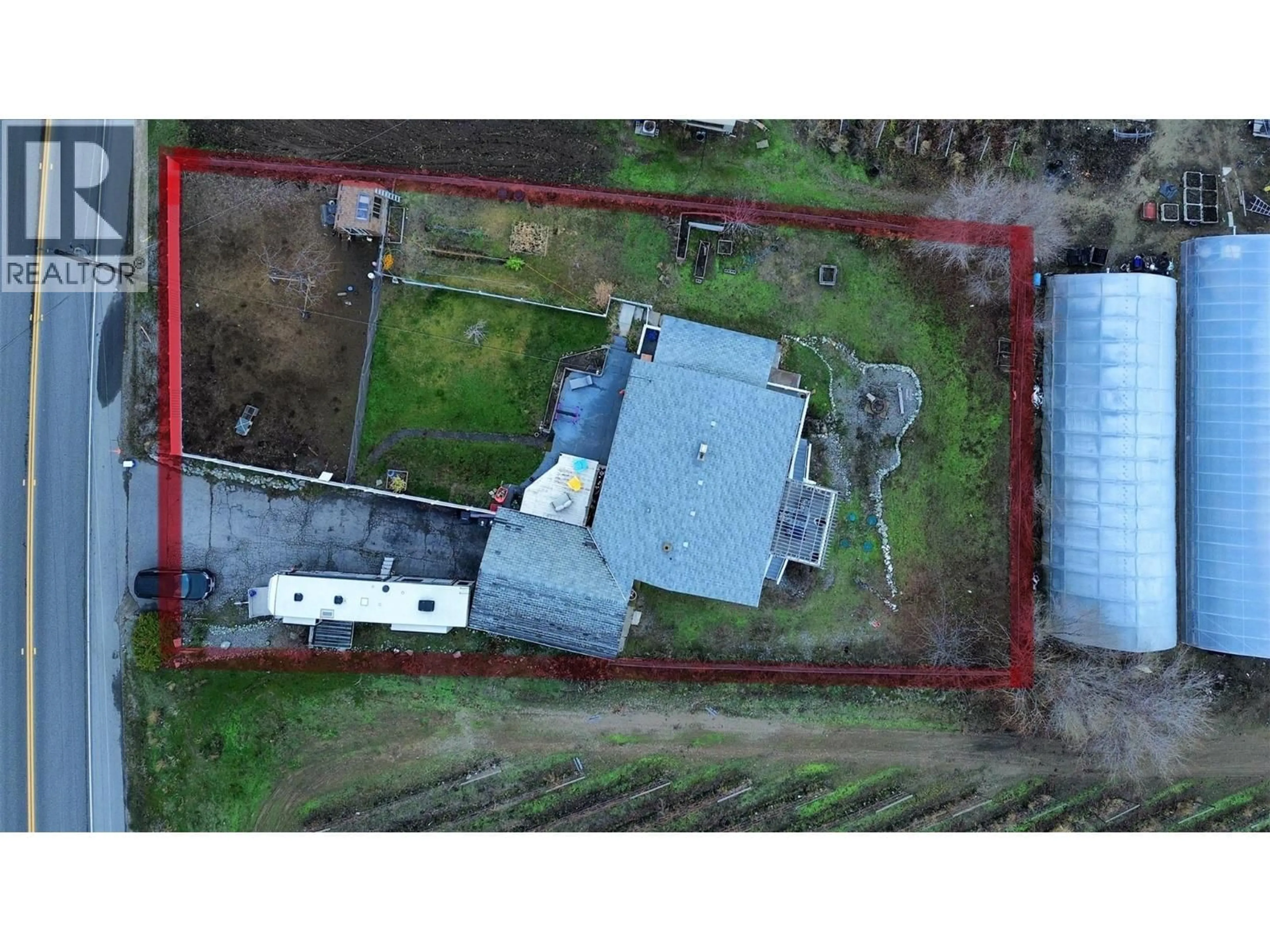 A pic from outside/outdoor area/front of a property/back of a property/a pic from drone, building for 1827 97TH STREET, Osoyoos British Columbia V0H1V1