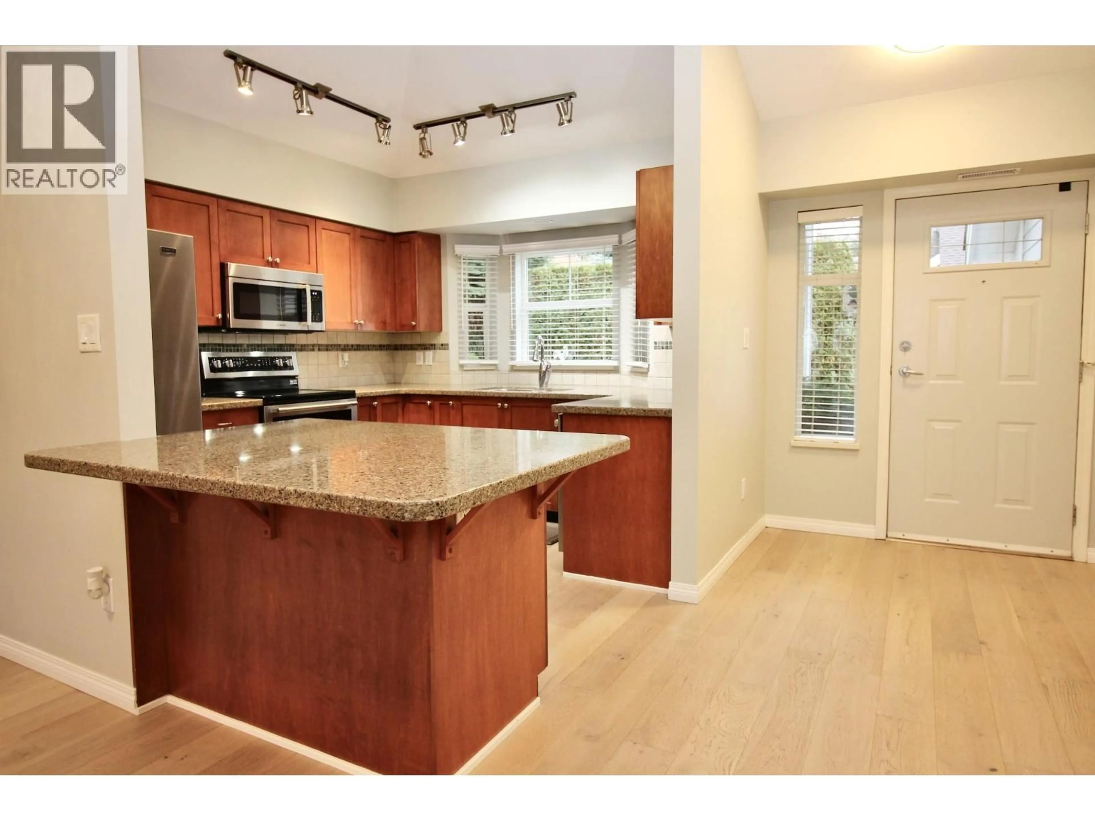 Open concept kitchen, ceramic/tile floor for 28 - 1853 PARKVIEW CRESCENT, Kelowna British Columbia V1X8A3