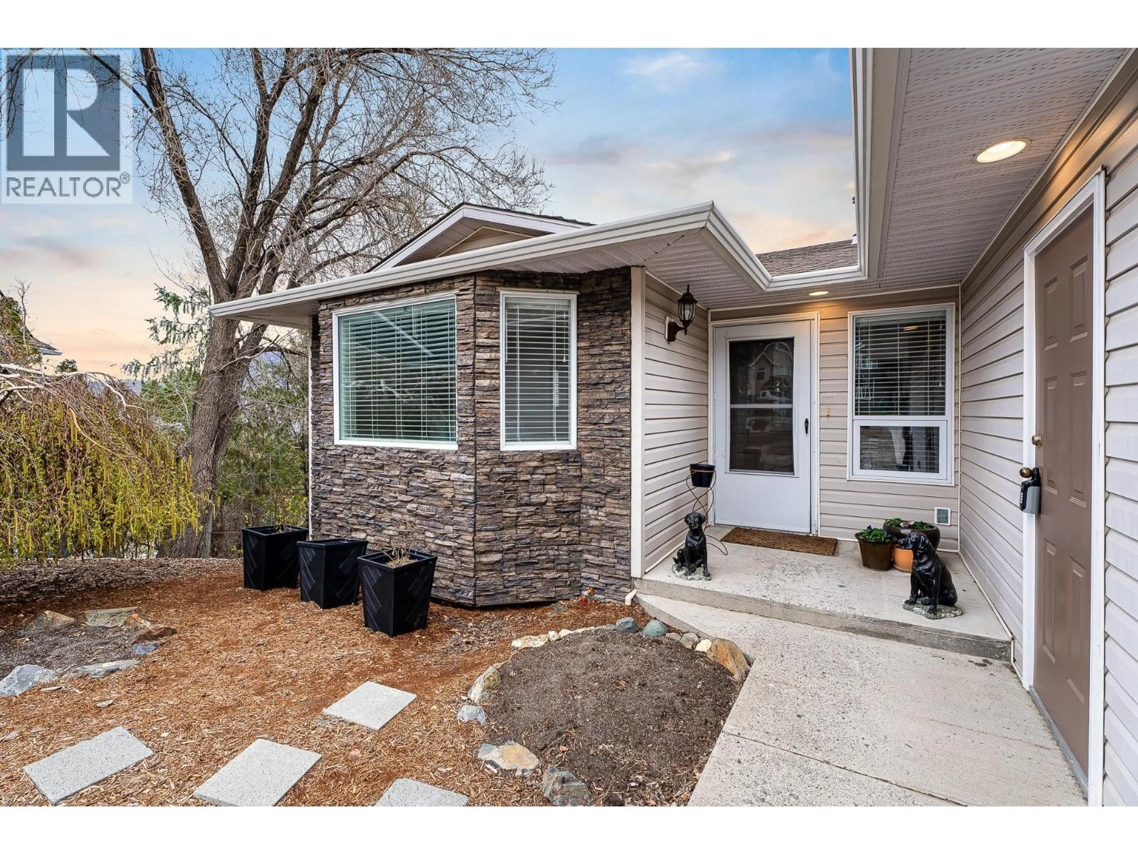 Home with vinyl exterior material, street for 1620 ISKUT PLACE, Kamloops British Columbia V2E2M4