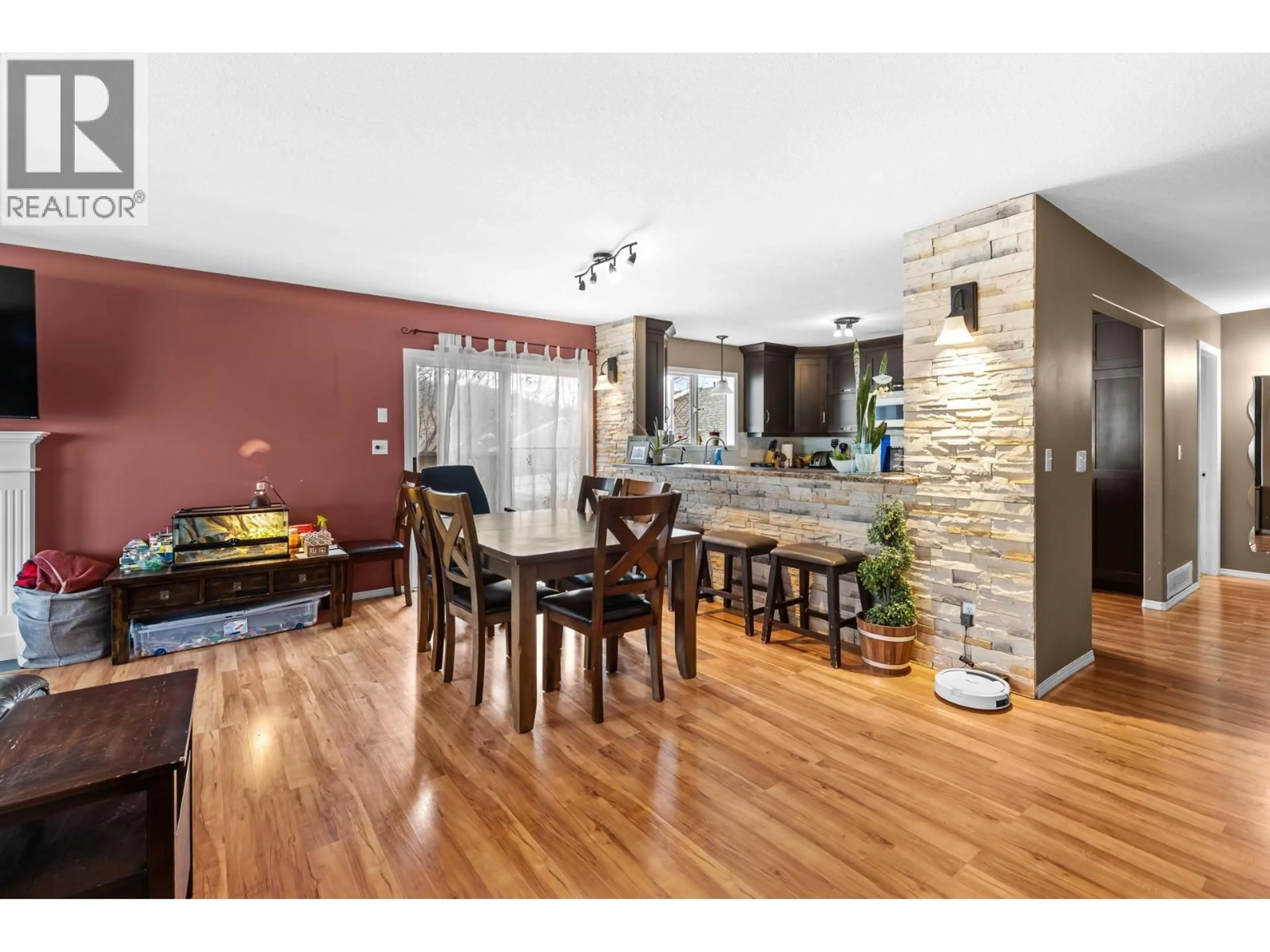 Open concept kitchen, wood/laminate floor for 38 - 555 GLENMEADOWS ROAD, Kelowna British Columbia V1V1V5