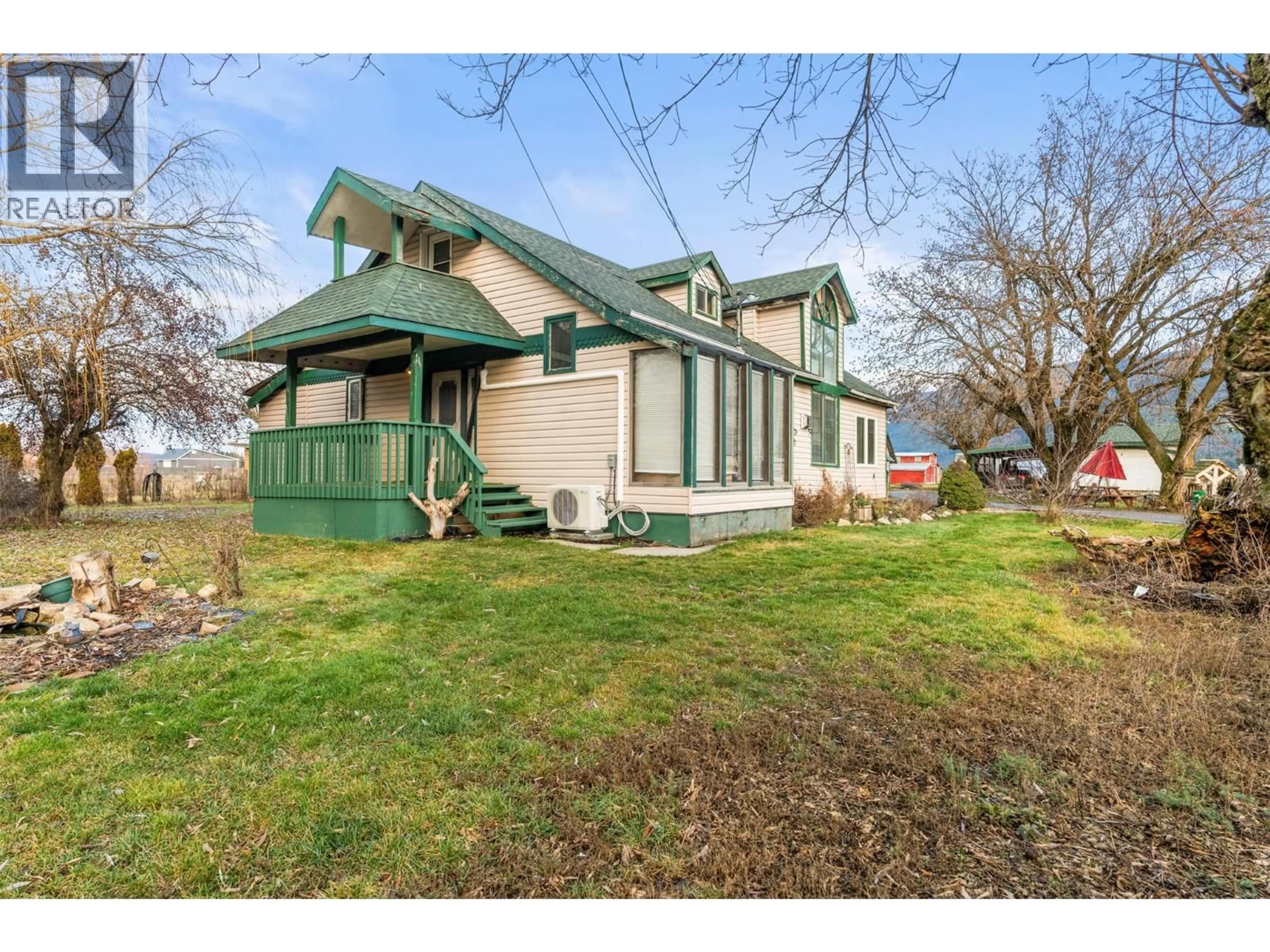 A pic from outside/outdoor area/front of a property/back of a property/a pic from drone, street for 1978 PLEASANT VALLEY ROAD, Spallumcheen British Columbia V4Y0T7