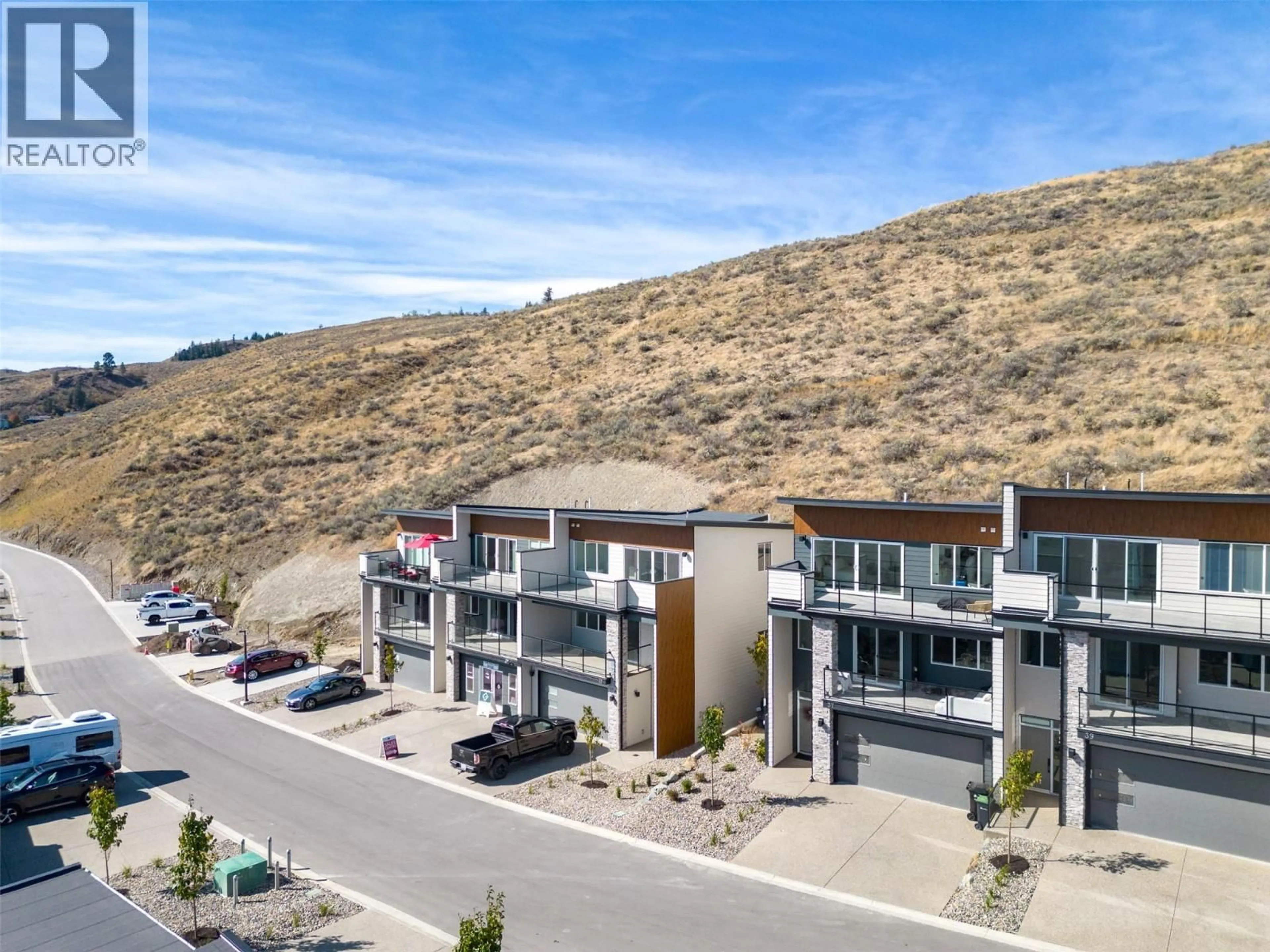 A pic from outside/outdoor area/front of a property/back of a property/a pic from drone, mountain view for 41 - 7735 OKANAGAN HILLS BOULEVARD, Vernon British Columbia V1H0A7