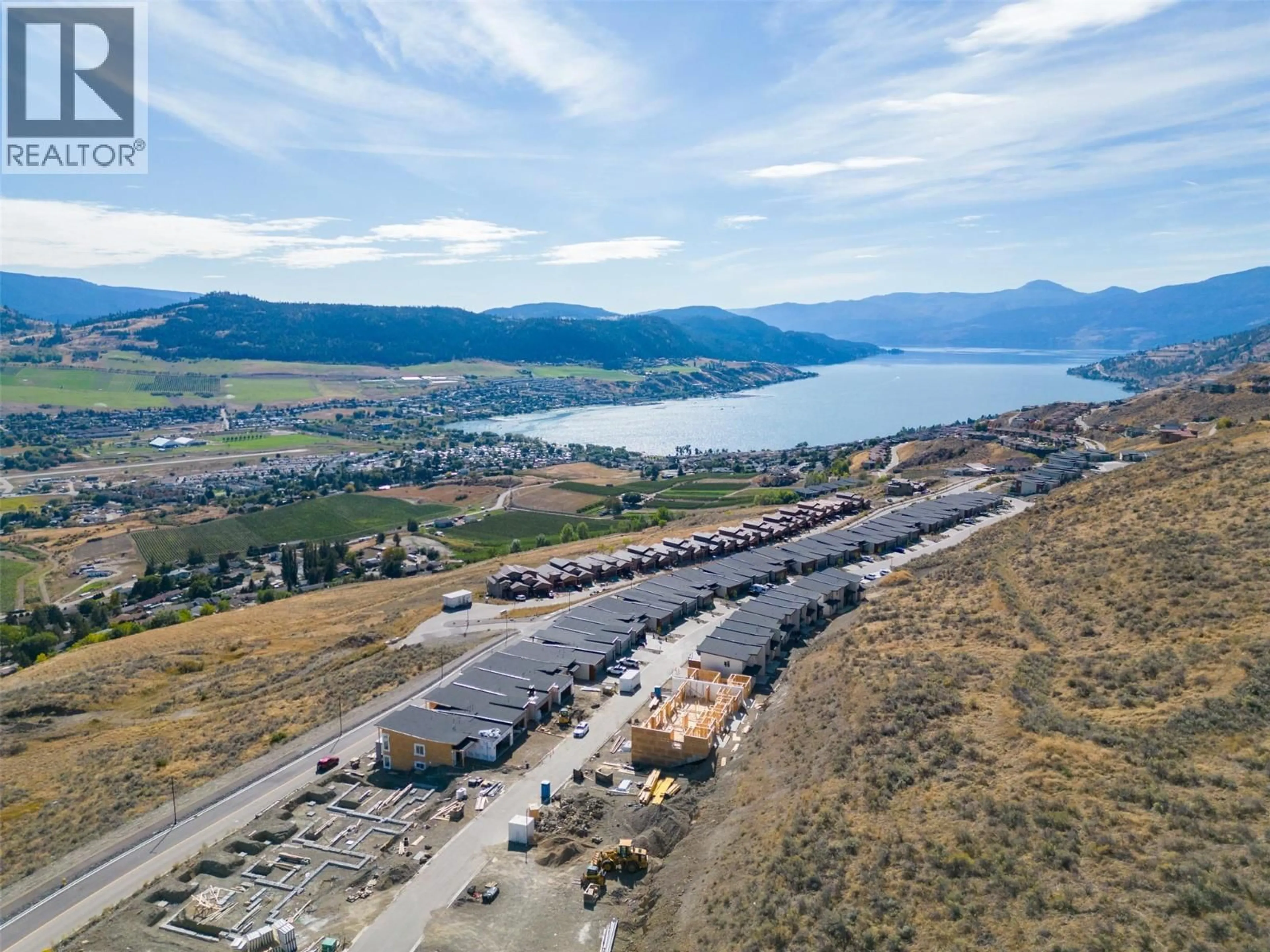 A pic from outside/outdoor area/front of a property/back of a property/a pic from drone, water/lake/river/ocean view for 41 - 7735 OKANAGAN HILLS BOULEVARD, Vernon British Columbia V1H0A7