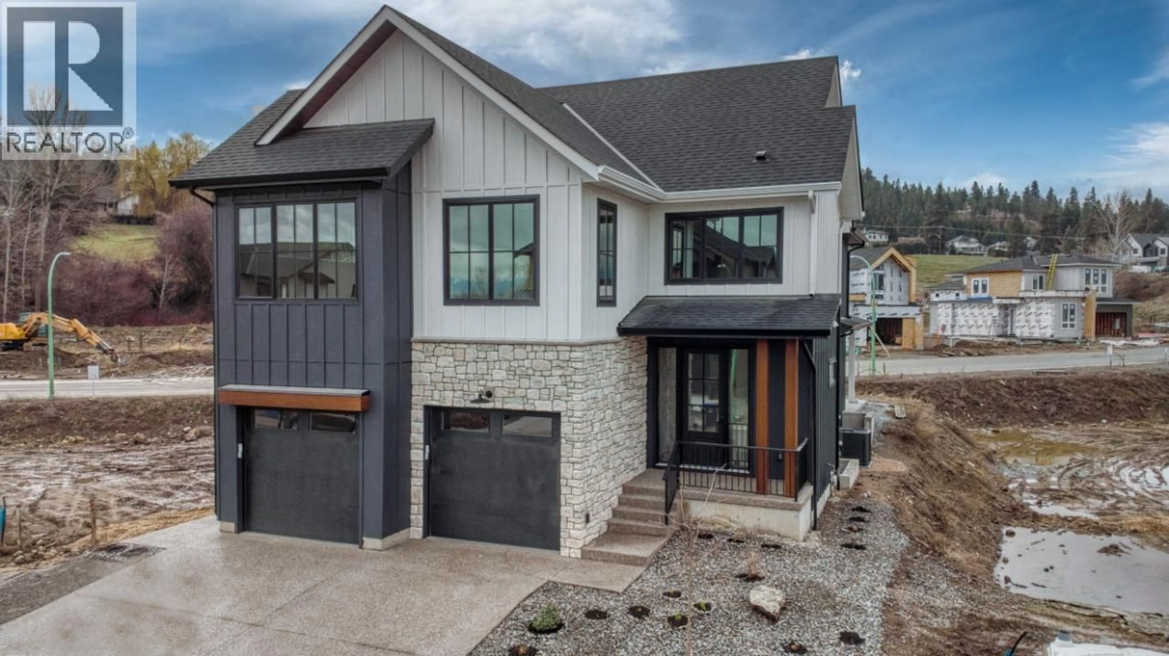 Home with brick exterior material, street for 937 BULL CRESCENT, Kelowna British Columbia V1W0E6