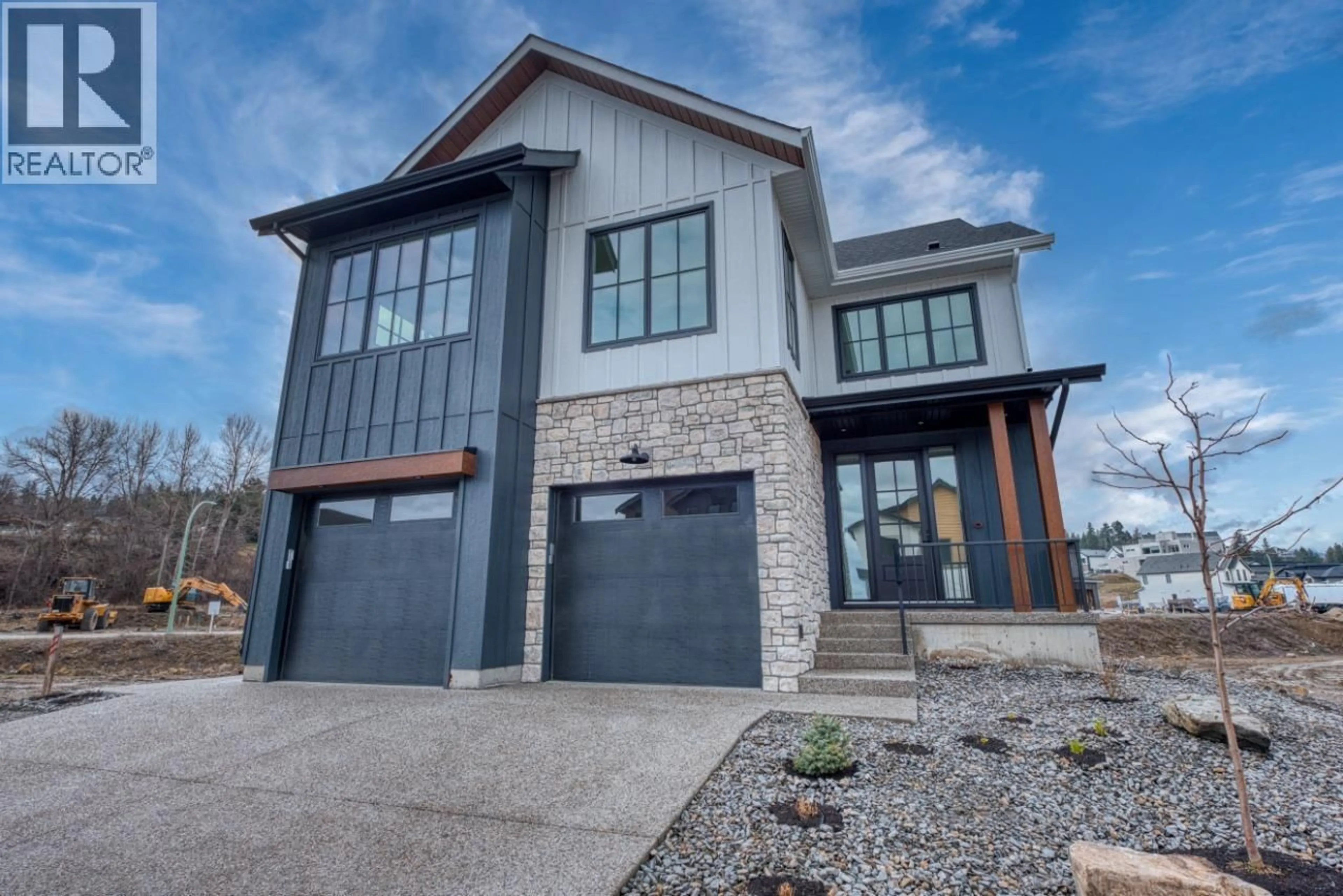 Home with brick exterior material, street for 937 BULL CRESCENT, Kelowna British Columbia V1W0E6