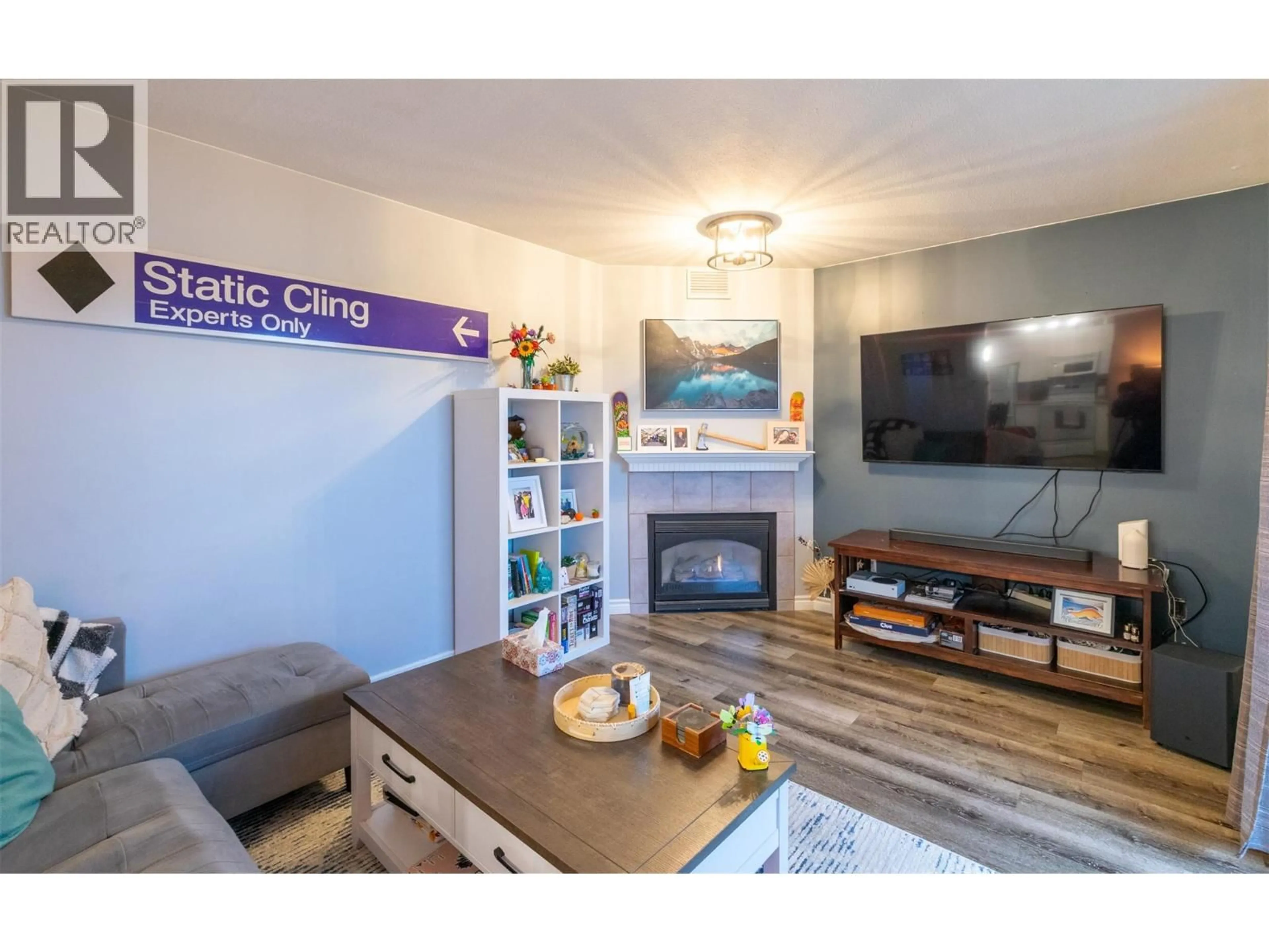 Living room with furniture, wood/laminate floor for 101 - 160 5 AVENUE SOUTHWEST, Salmon Arm British Columbia V1E1R4