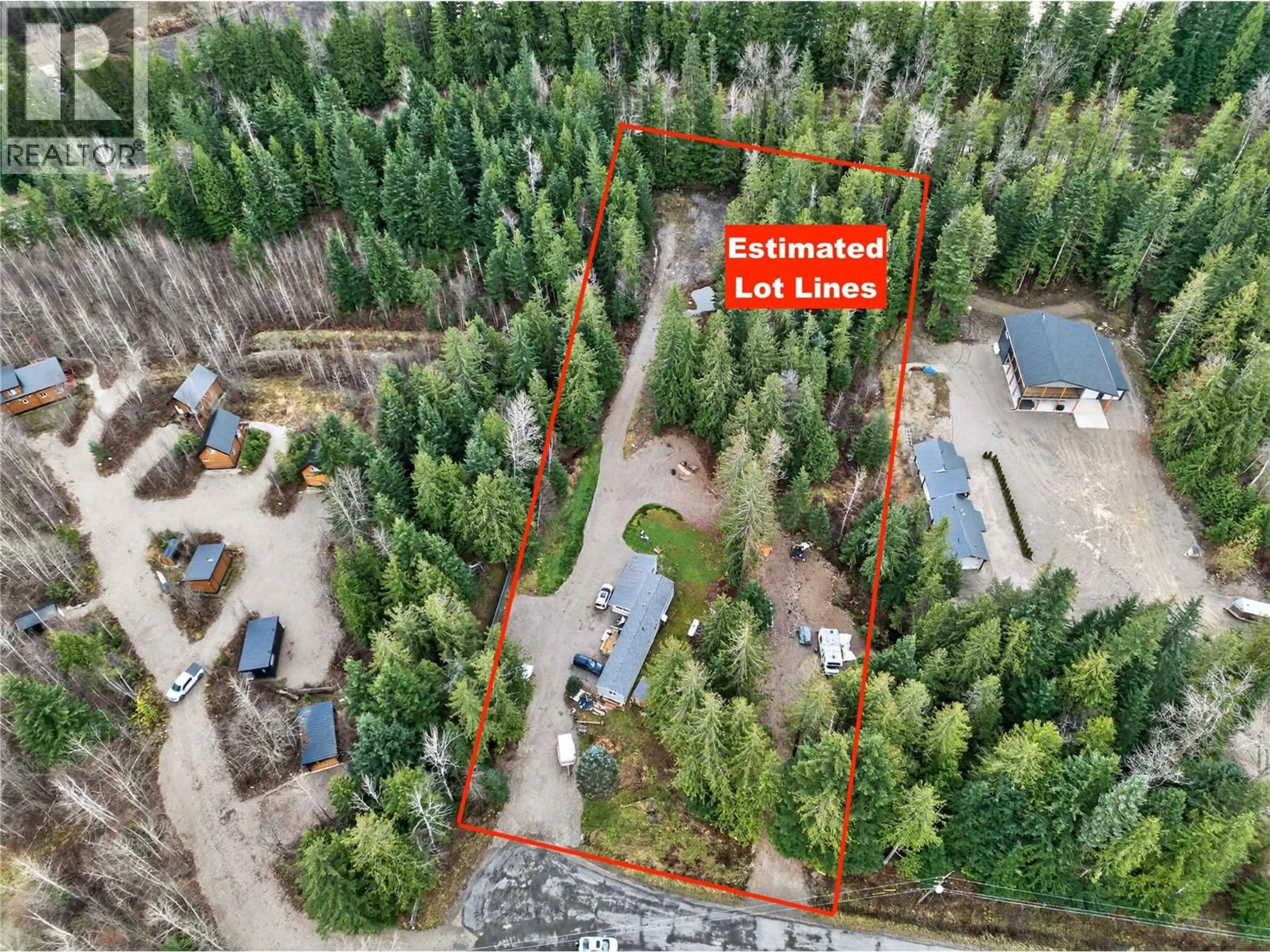 A pic from outside/outdoor area/front of a property/back of a property/a pic from drone, forest/trees view for 3277 LOSCHINSKI ROAD, Revelstoke British Columbia V0E2S0