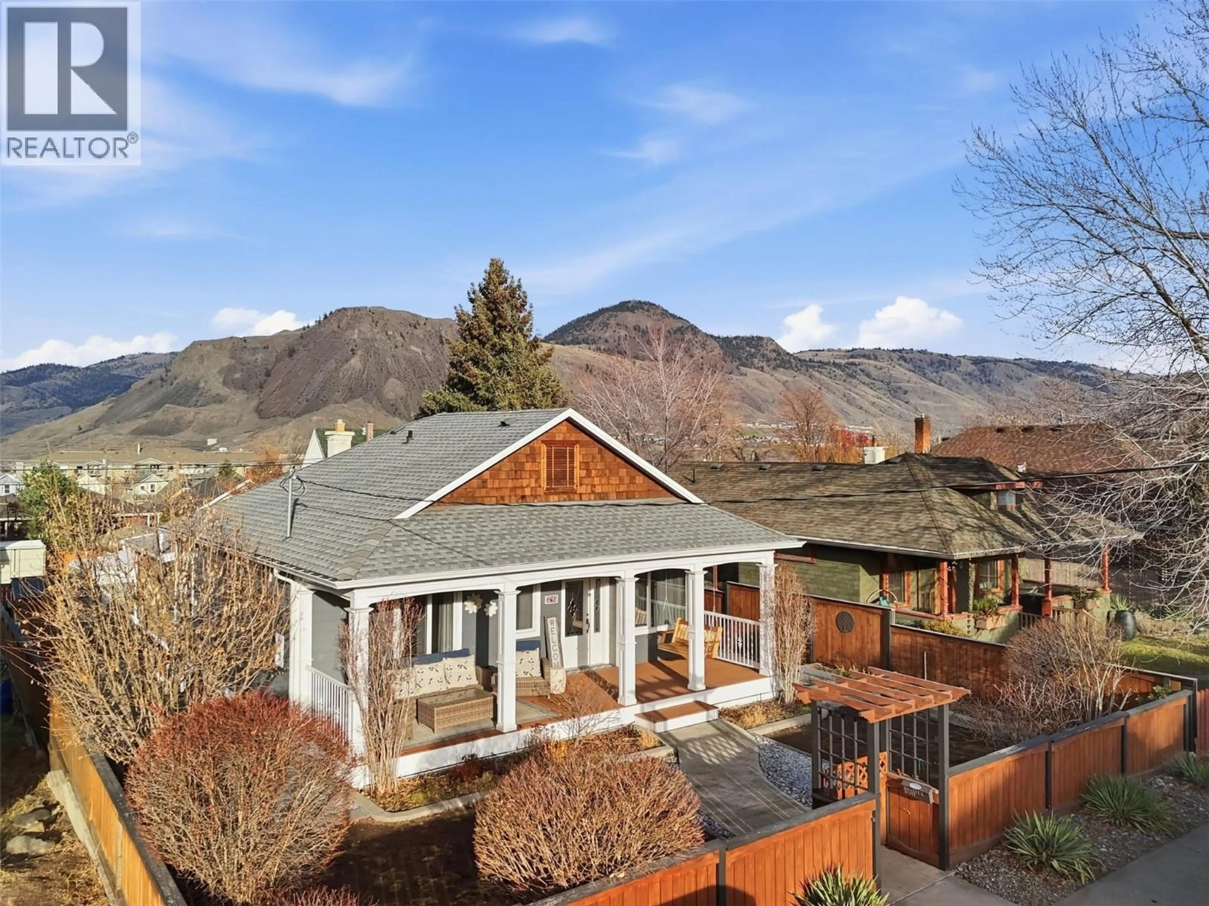 A pic from outside/outdoor area/front of a property/back of a property/a pic from drone, mountain view for 660 BATTLE STREET, Kamloops British Columbia V2C2M3