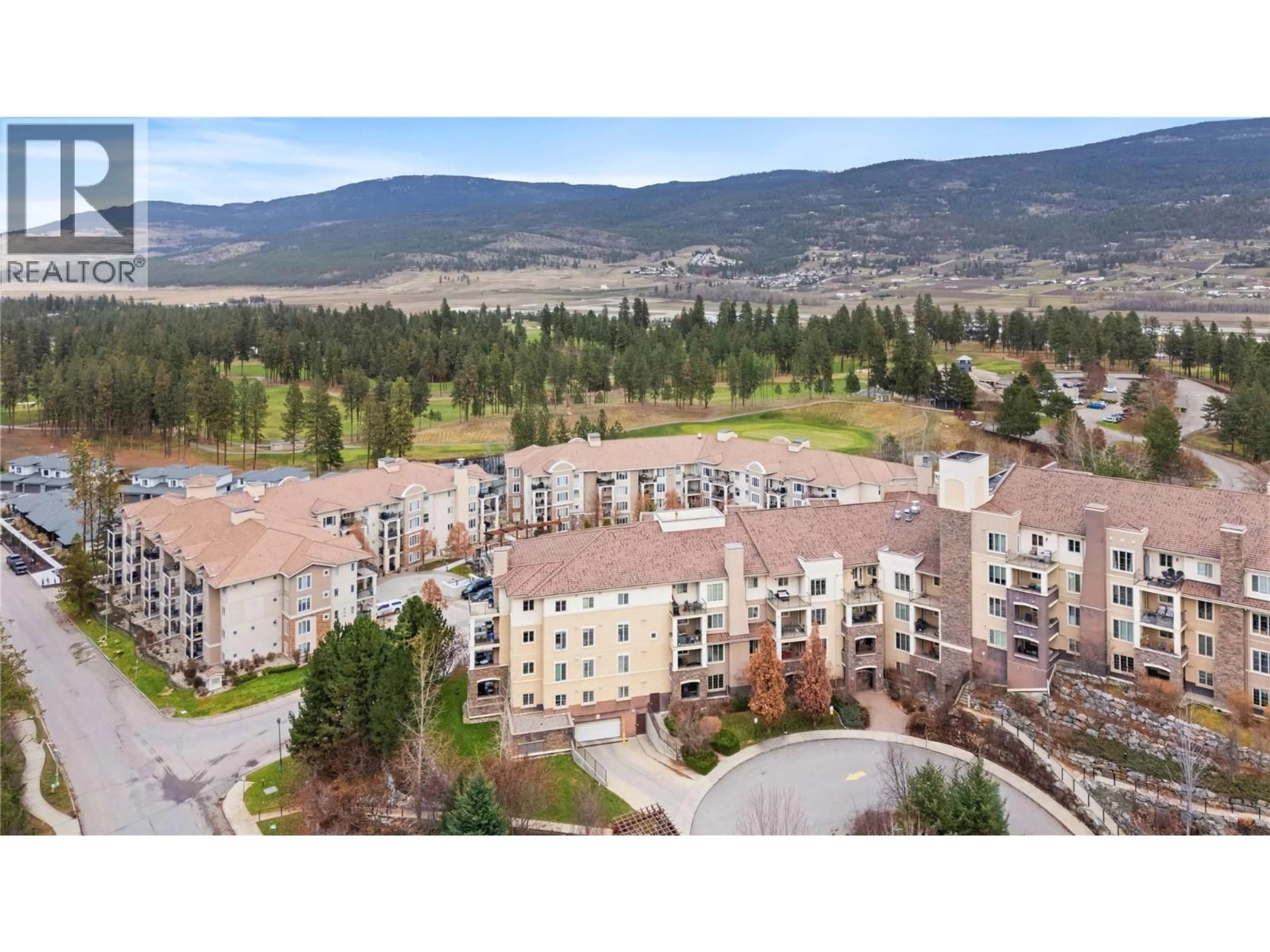 A pic from outside/outdoor area/front of a property/back of a property/a pic from drone, mountain view for 1405 - 1875 COUNTRY CLUB DRIVE, Kelowna British Columbia V1V2W7