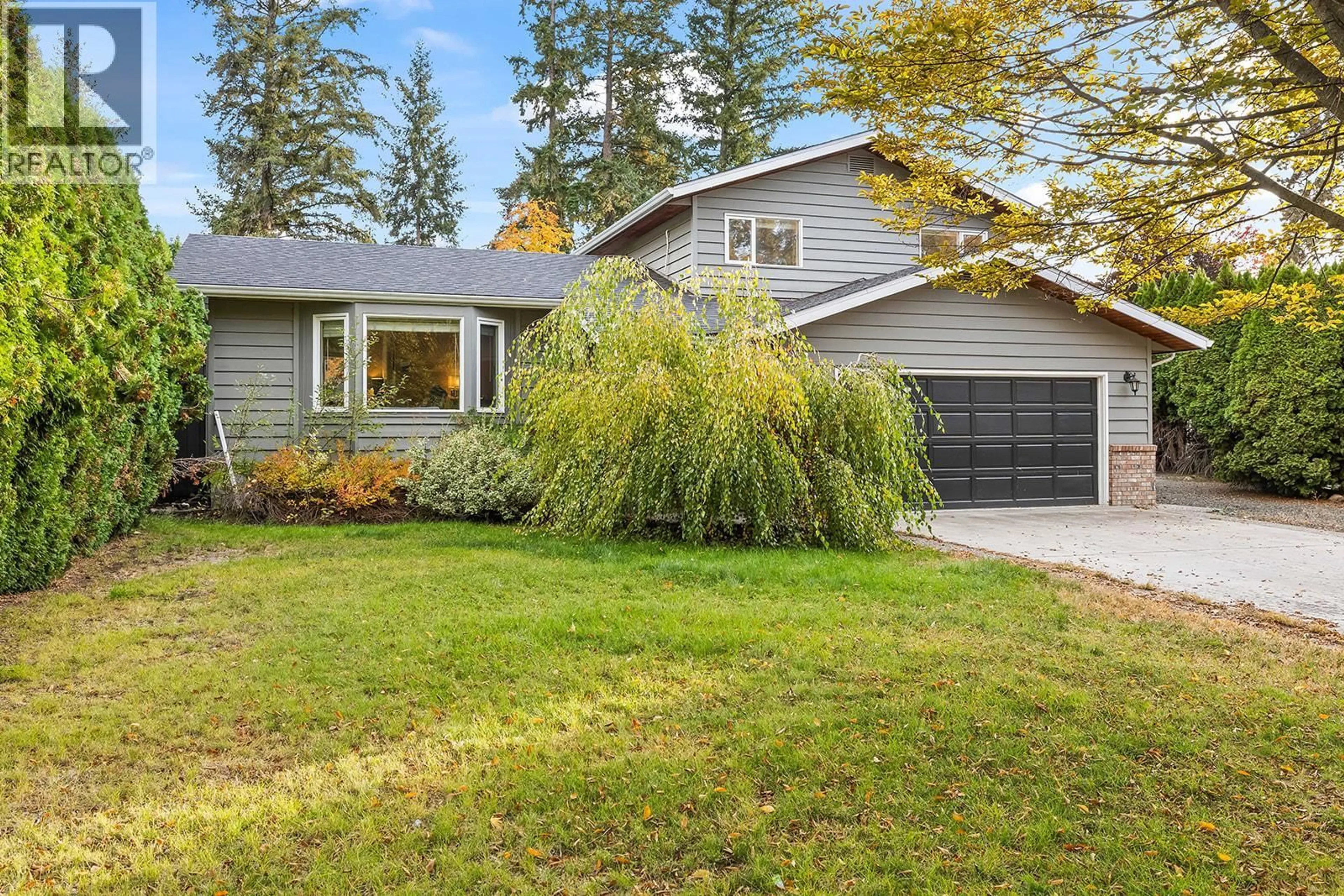 Home with vinyl exterior material, street for 875 CORONADO CRESCENT, Kelowna British Columbia V1W2K3