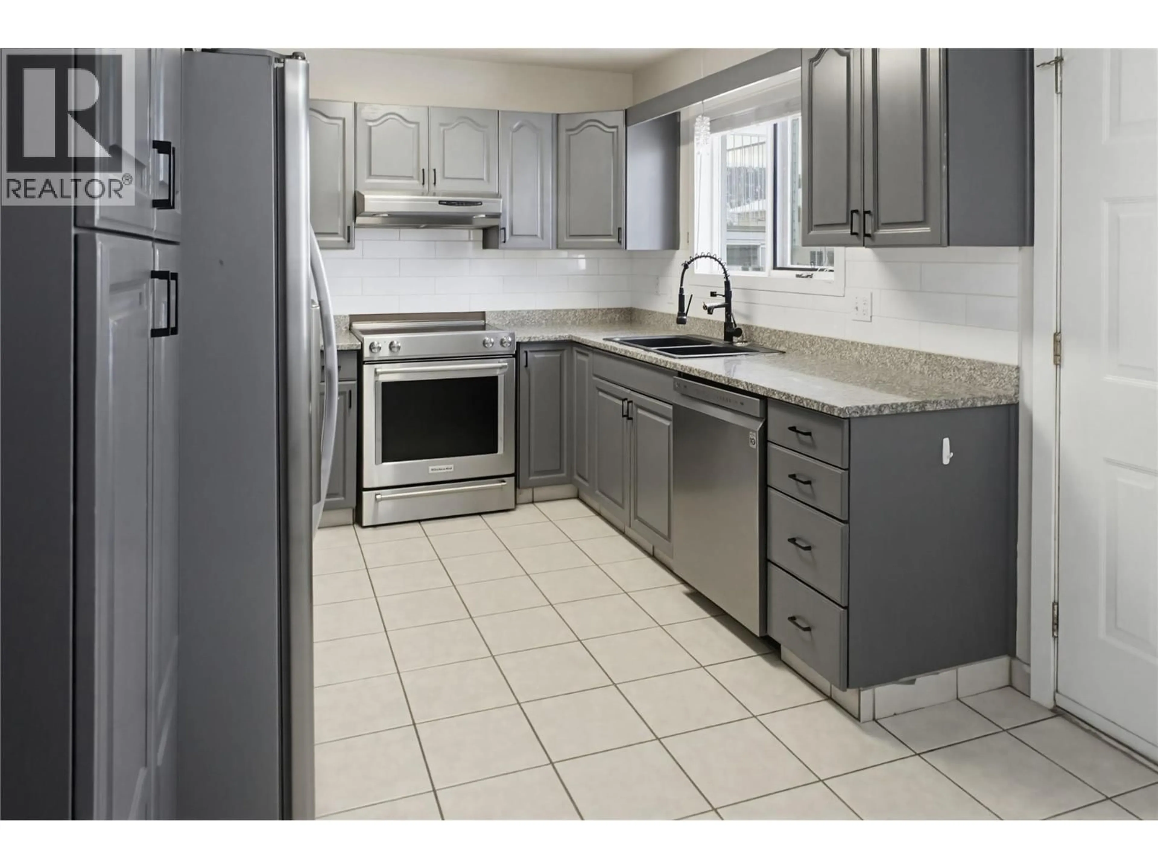 Standard kitchen, ceramic/tile floor for 1133 13TH STREET, Kamloops British Columbia V2B8K4