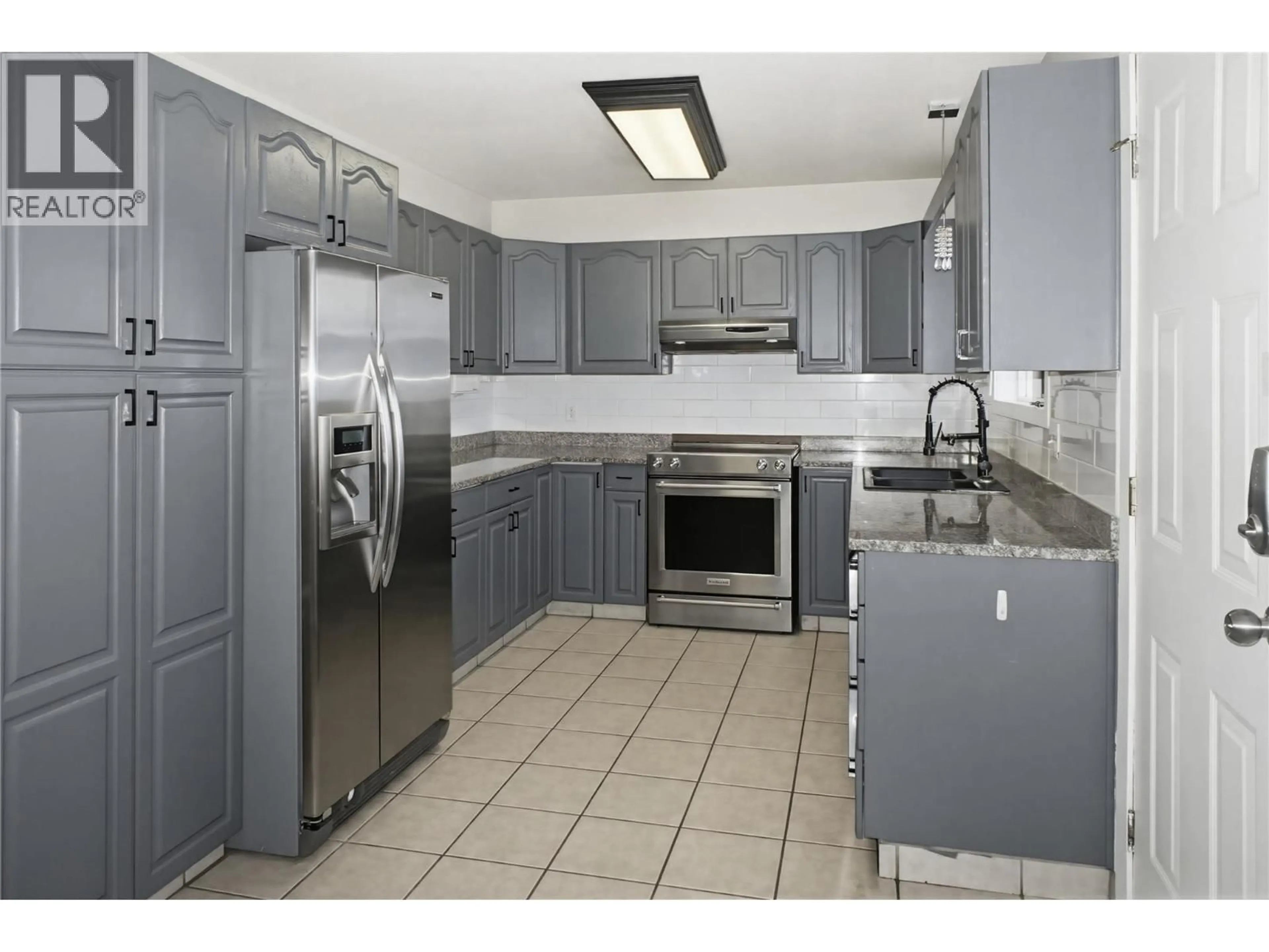 Standard kitchen, ceramic/tile floor for 1133 13TH STREET, Kamloops British Columbia V2B8K4