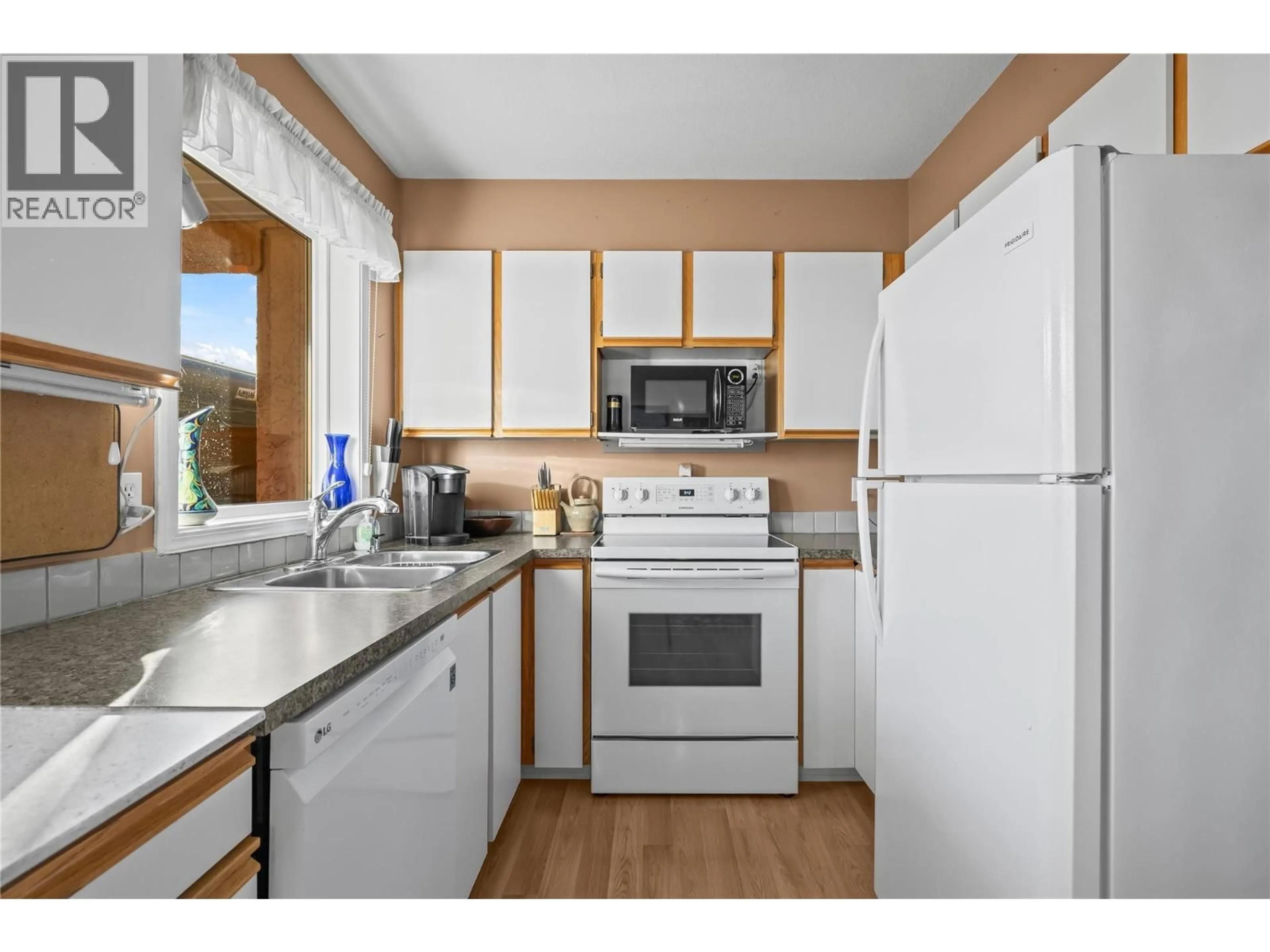 Standard kitchen, wood/laminate floor for 6 - 2433 INGRAM ROAD, West Kelowna British Columbia V4T1L5