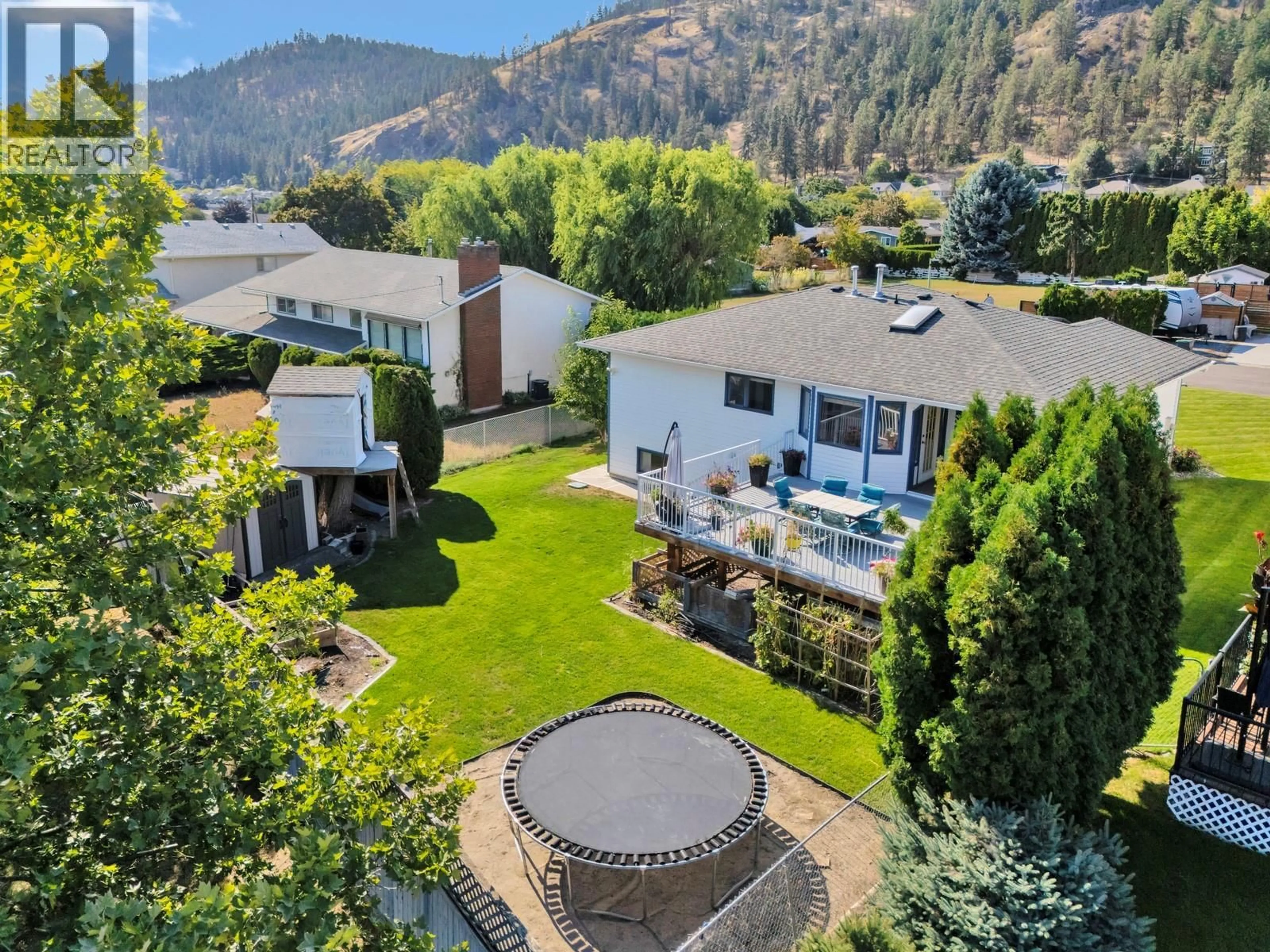 A pic from outside/outdoor area/front of a property/back of a property/a pic from drone, mountain view for 325 MCTAVISH ROAD, Kelowna British Columbia V1V1P2