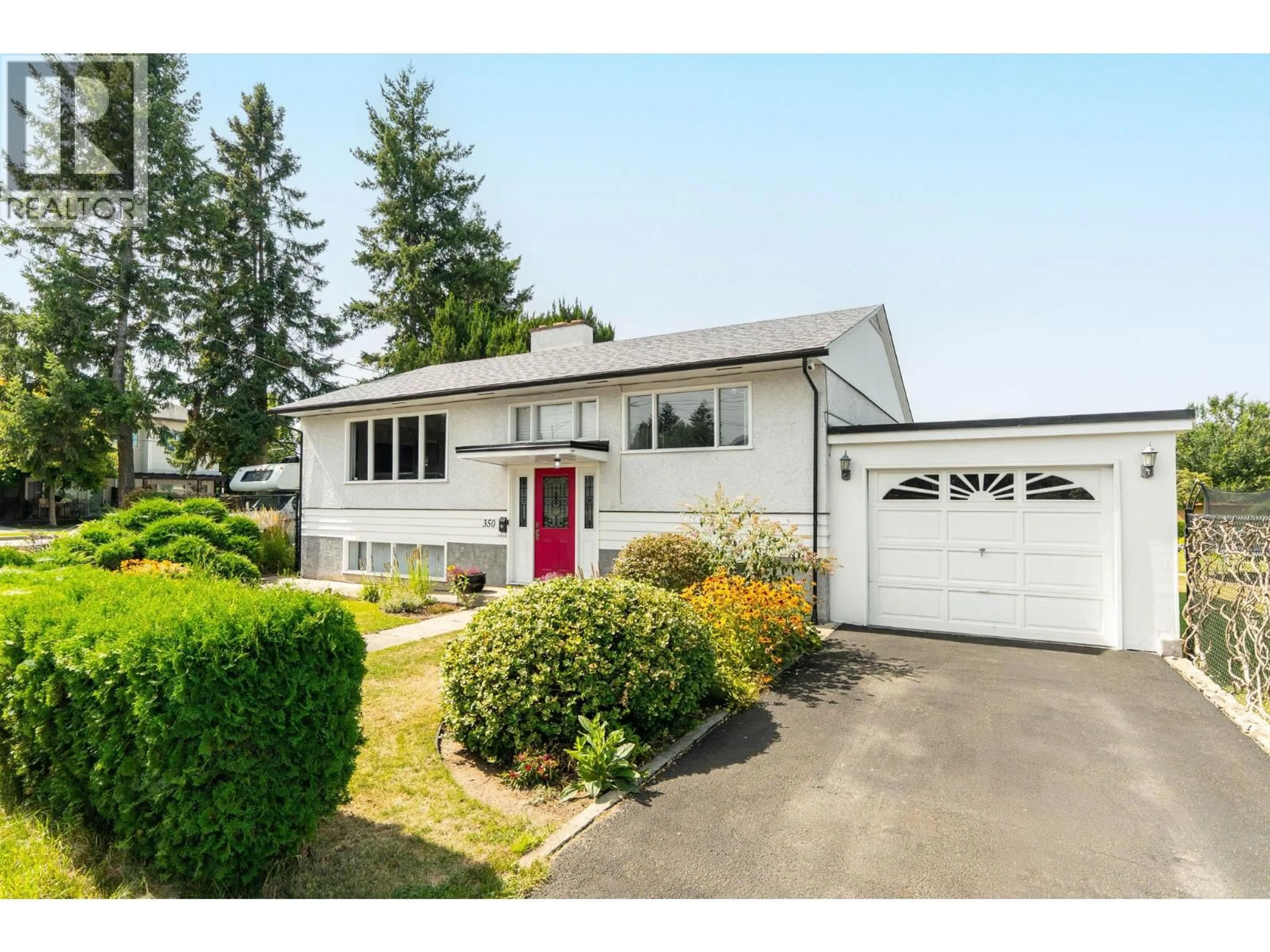 Home with vinyl exterior material, street for 350 FLEMING ROAD, Kelowna British Columbia V1X3Z3