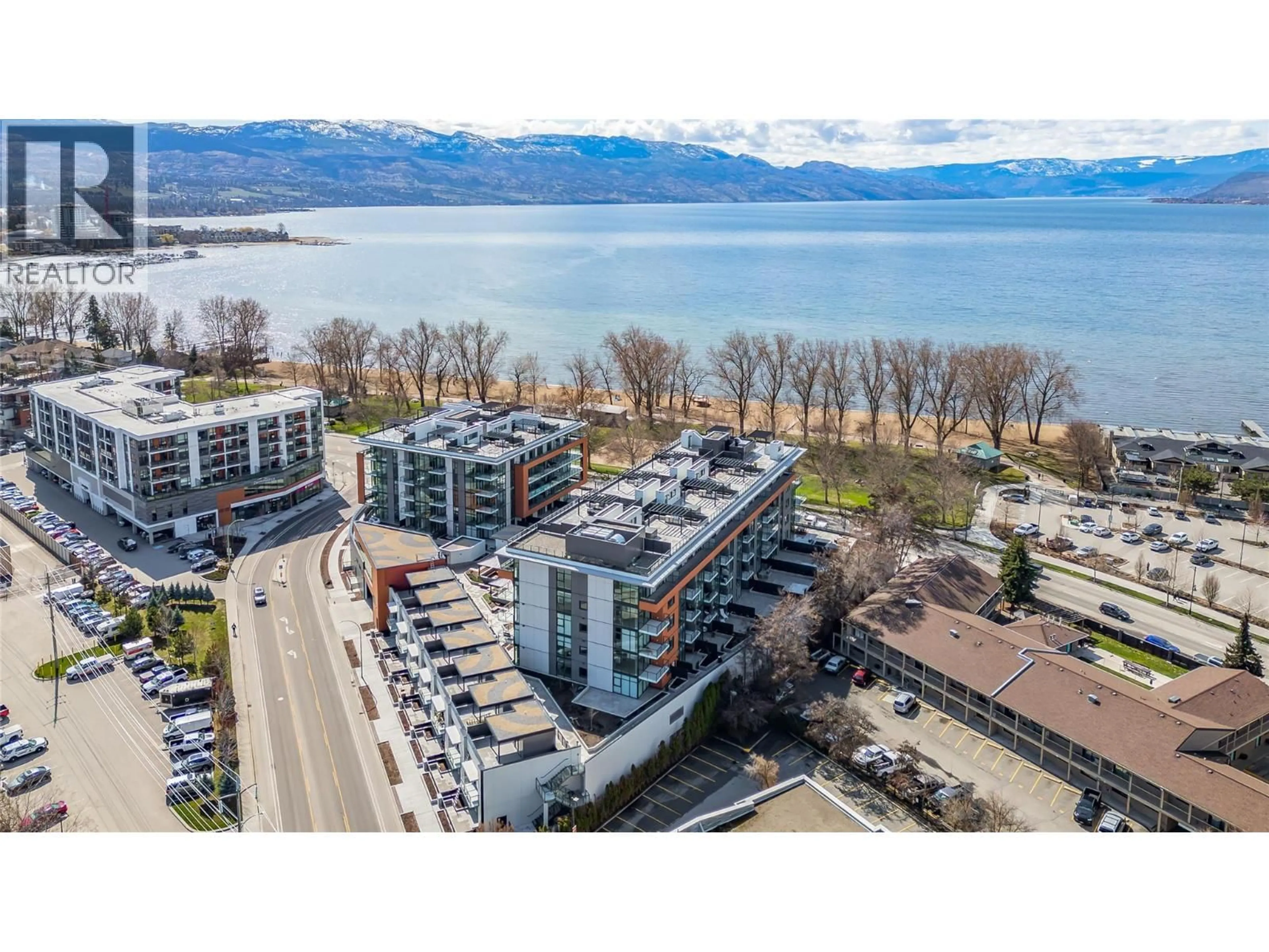 A pic from outside/outdoor area/front of a property/back of a property/a pic from drone, water/lake/river/ocean view for PH S607 - 3409 LAKESHORE ROAD, Kelowna British Columbia V1W0G6