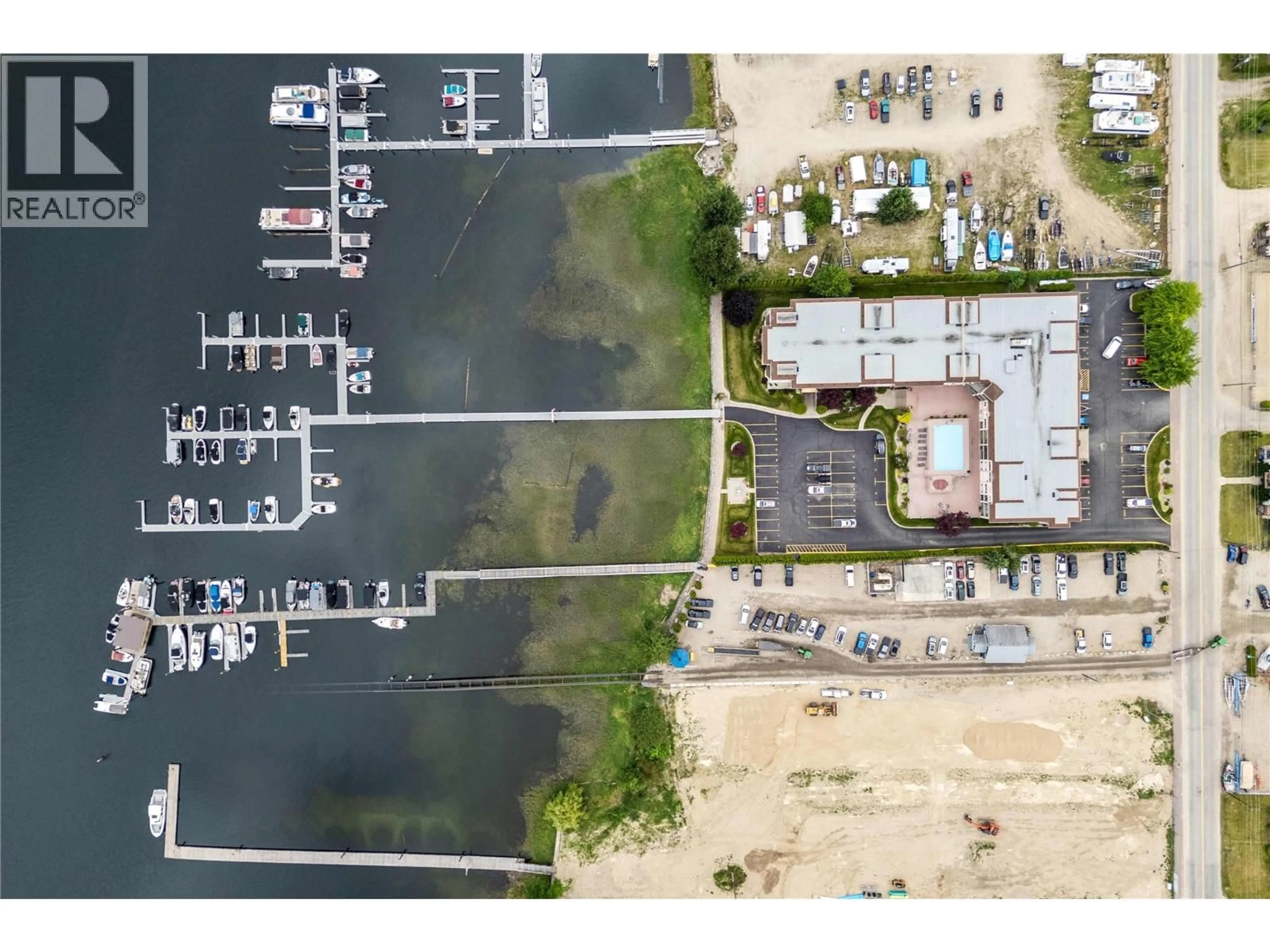 A pic from outside/outdoor area/front of a property/back of a property/a pic from drone, water/lake/river/ocean view for 206 - 1002 RIVERSIDE AVENUE, Sicamous British Columbia V0E2V0