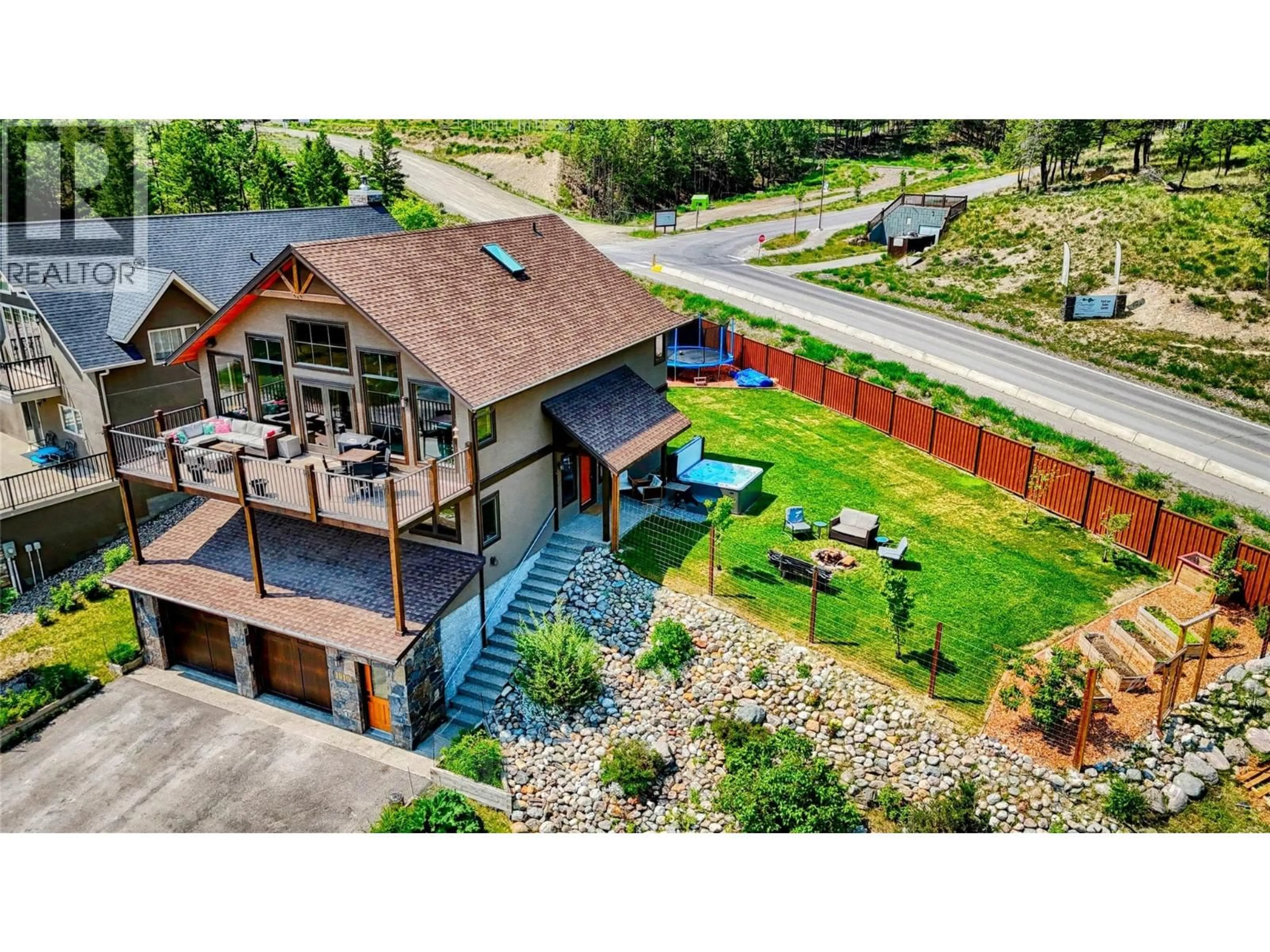 A pic from outside/outdoor area/front of a property/back of a property/a pic from drone, mountain view for 1910 PINERIDGE DRIVE, Invermere British Columbia V0A1K4