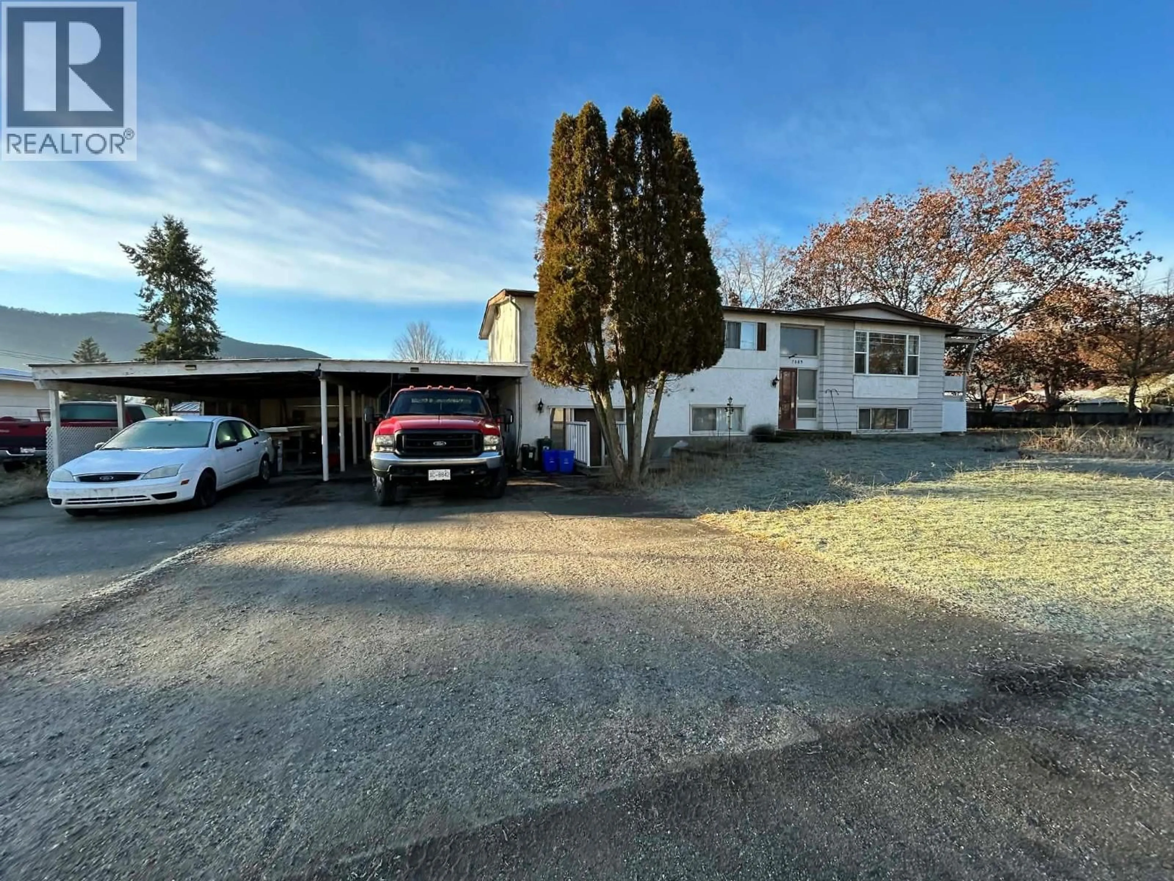 A pic from outside/outdoor area/front of a property/back of a property/a pic from drone, street for 7083 DONALDSON DRIVE, Grand Forks British Columbia V0H1H0