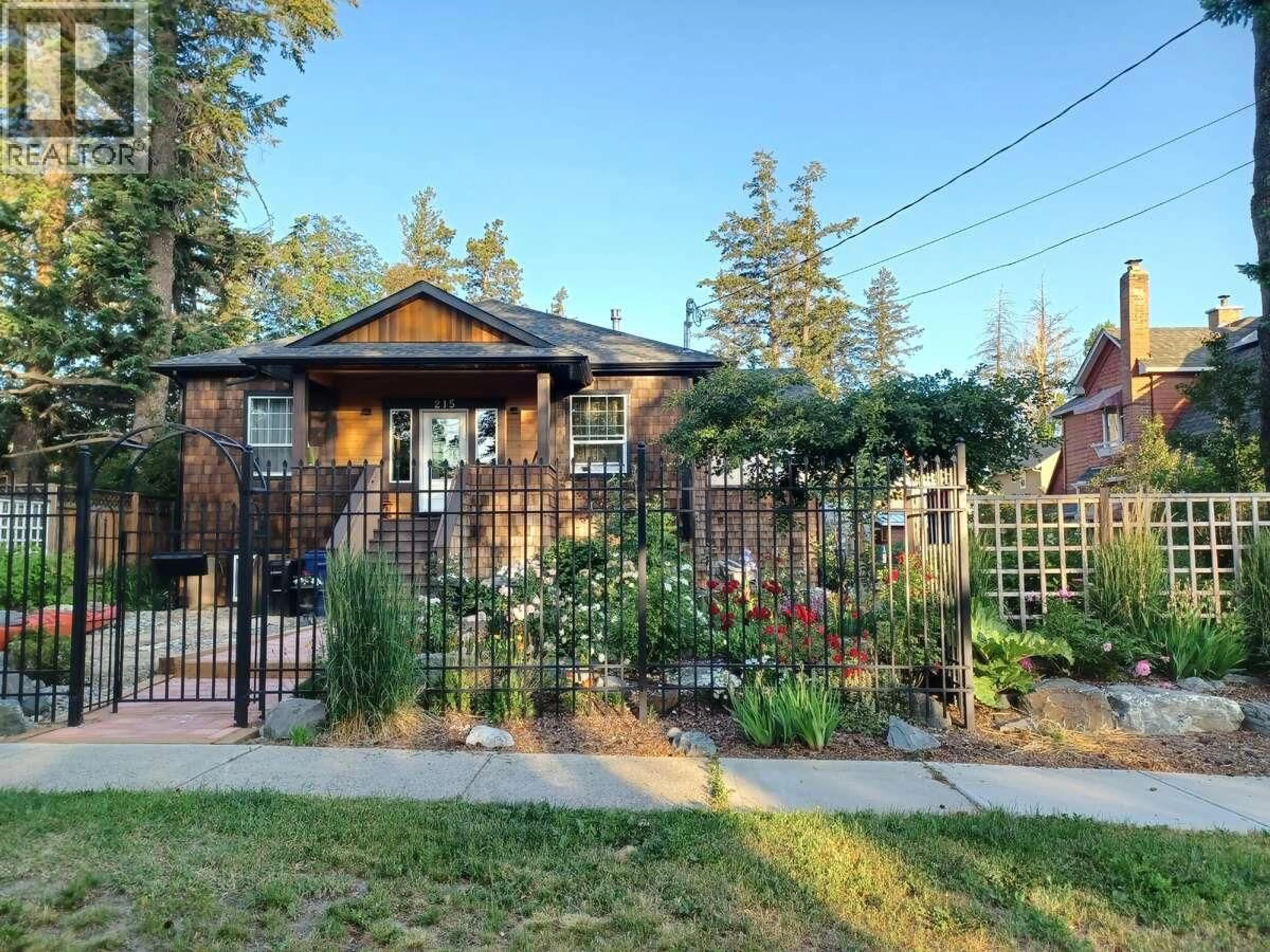 Home with brick exterior material, street for 215 13TH AVENUE SOUTH, Cranbrook British Columbia V1C2V7