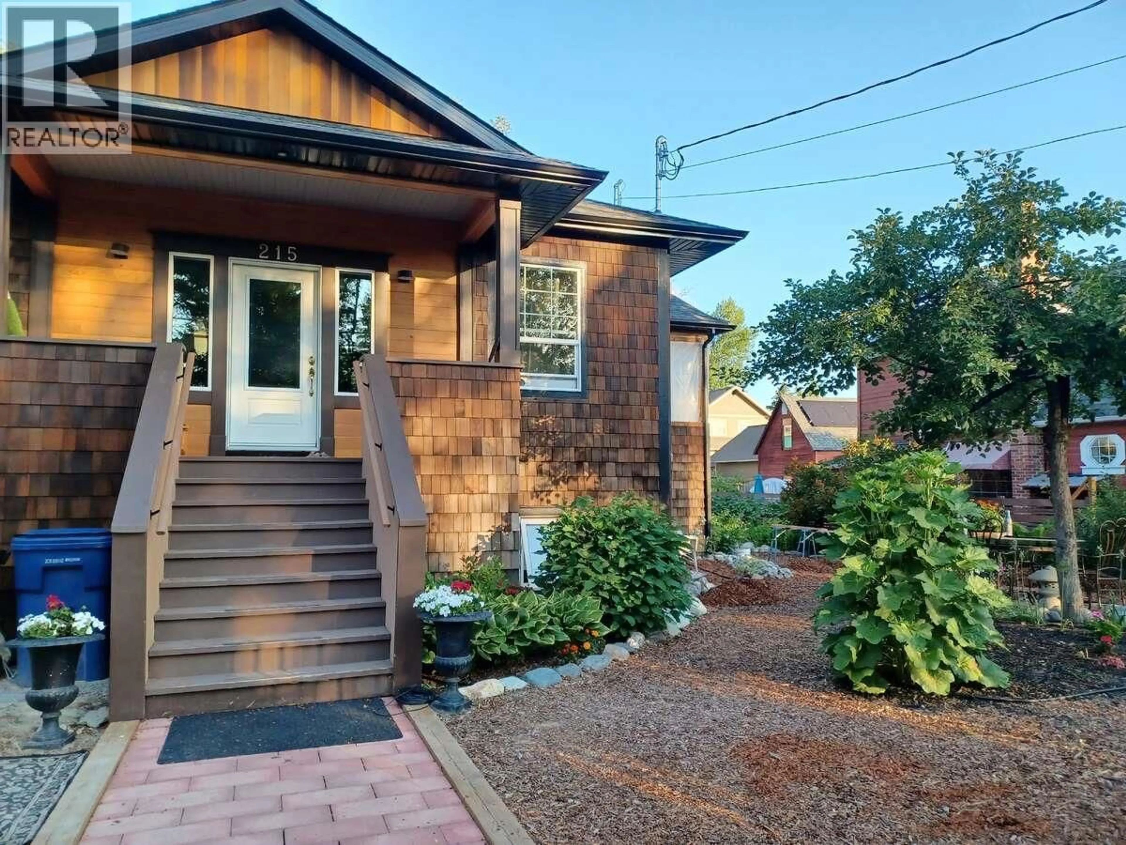 Home with brick exterior material, street for 215 13TH AVENUE SOUTH, Cranbrook British Columbia V1C2V7