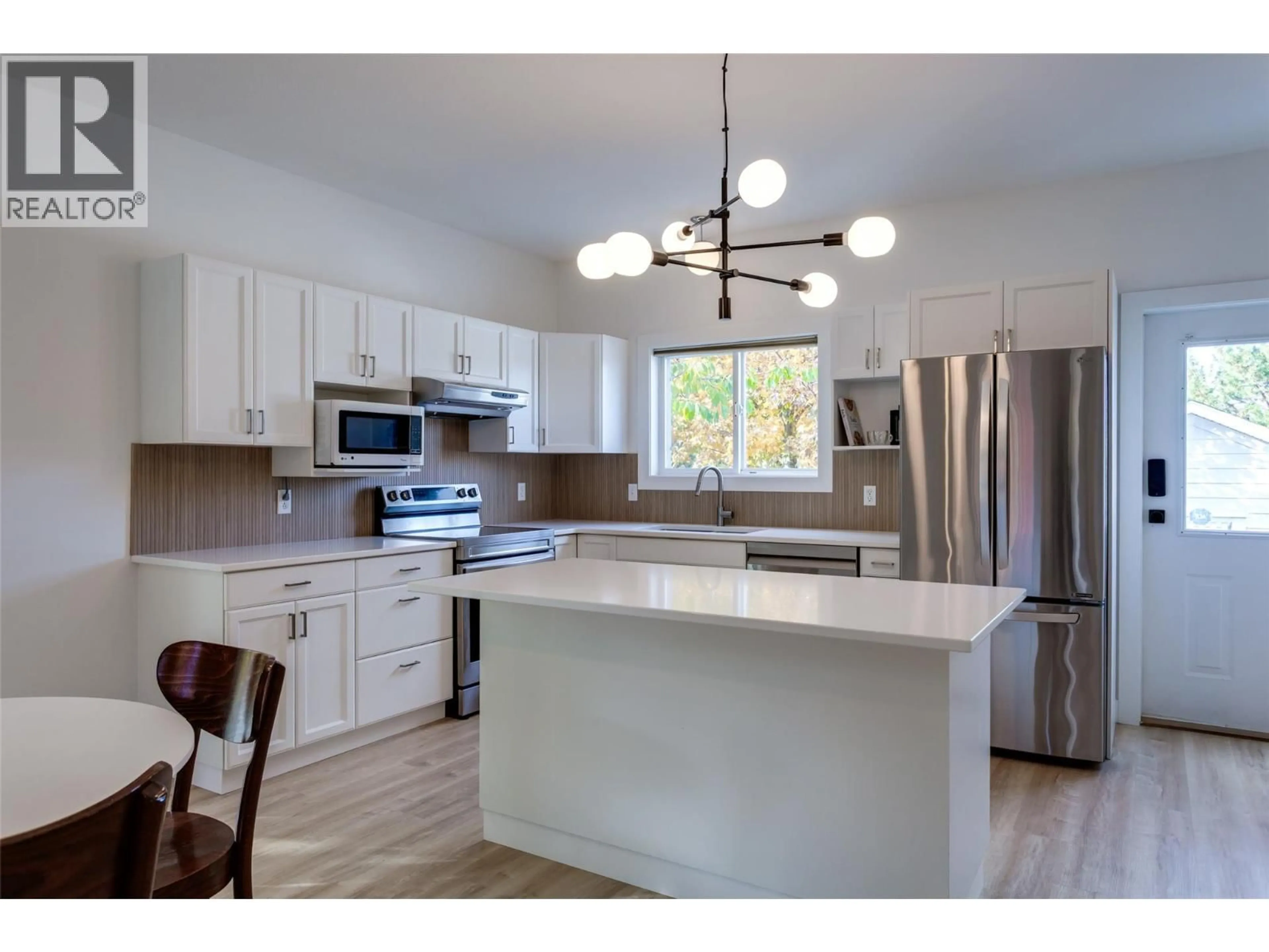 Open concept kitchen, unknown for 388 MCCARREN AVENUE, Kelowna British Columbia V1W4W3