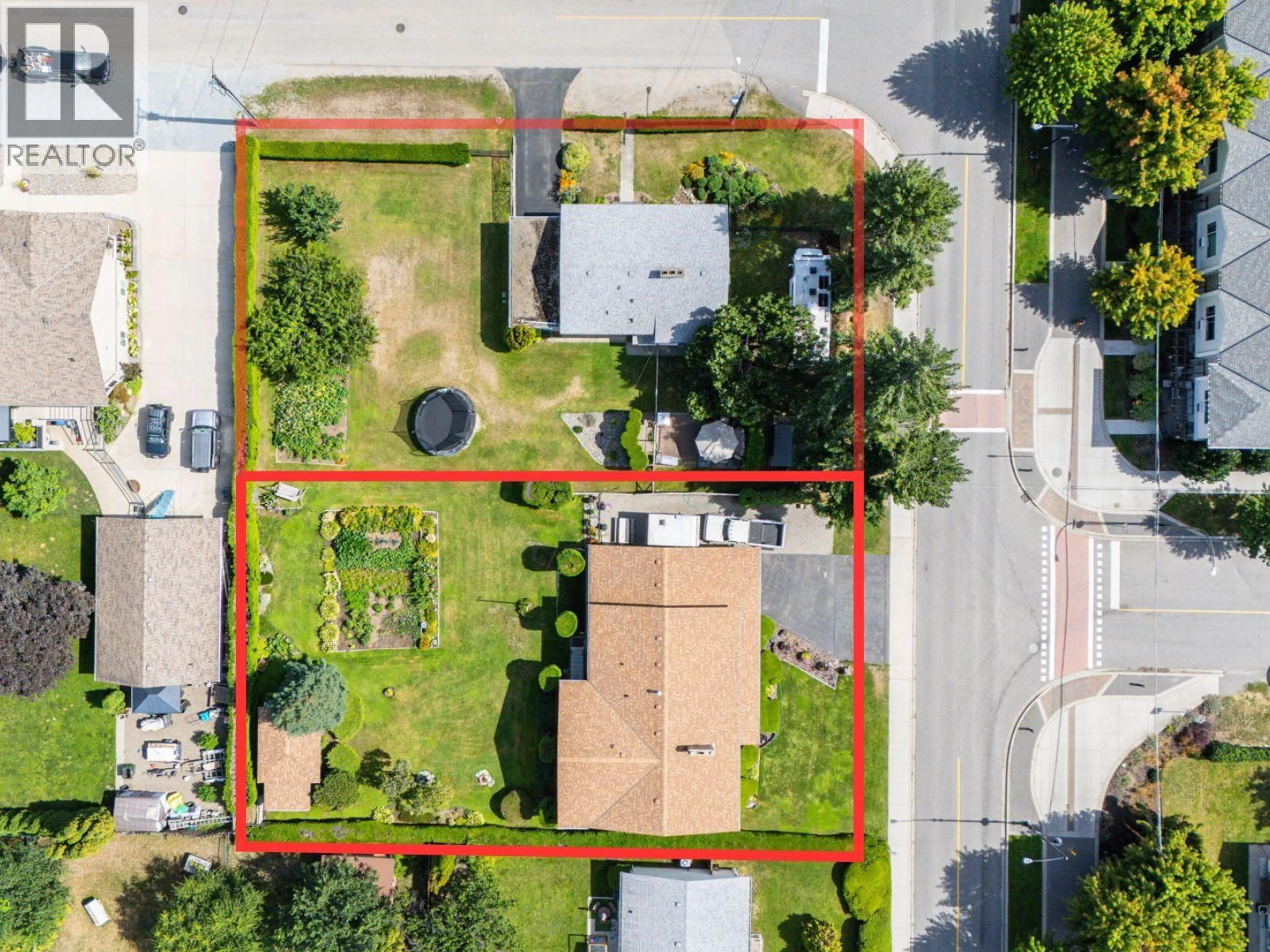 A pic from outside/outdoor area/front of a property/back of a property/a pic from drone, street for 1090 HOUGHTON ROAD, Kelowna British Columbia V1X6G8