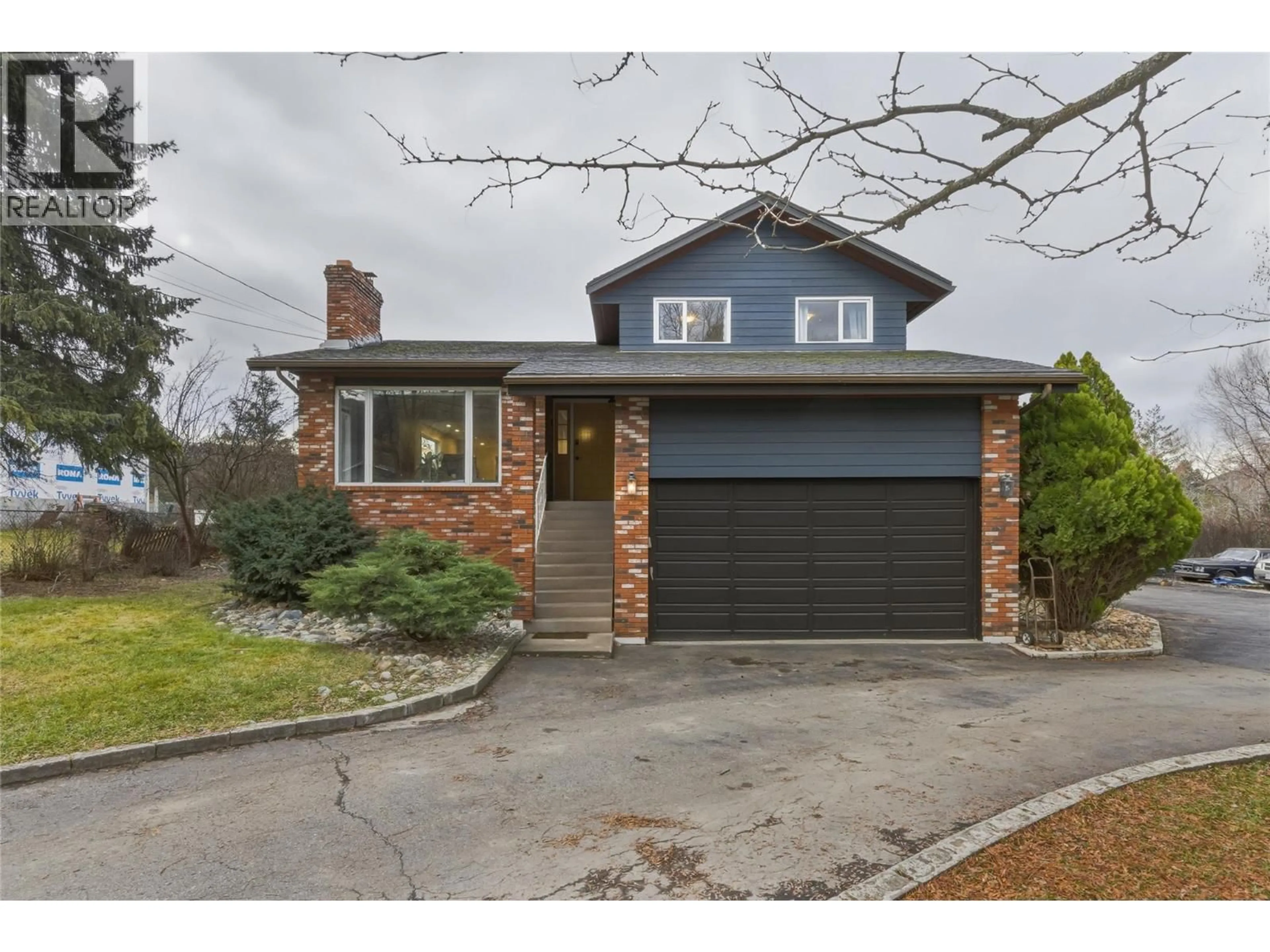 Home with brick exterior material, street for 535 TOD MOUNTAIN ROAD, Kamloops British Columbia V2H0B9