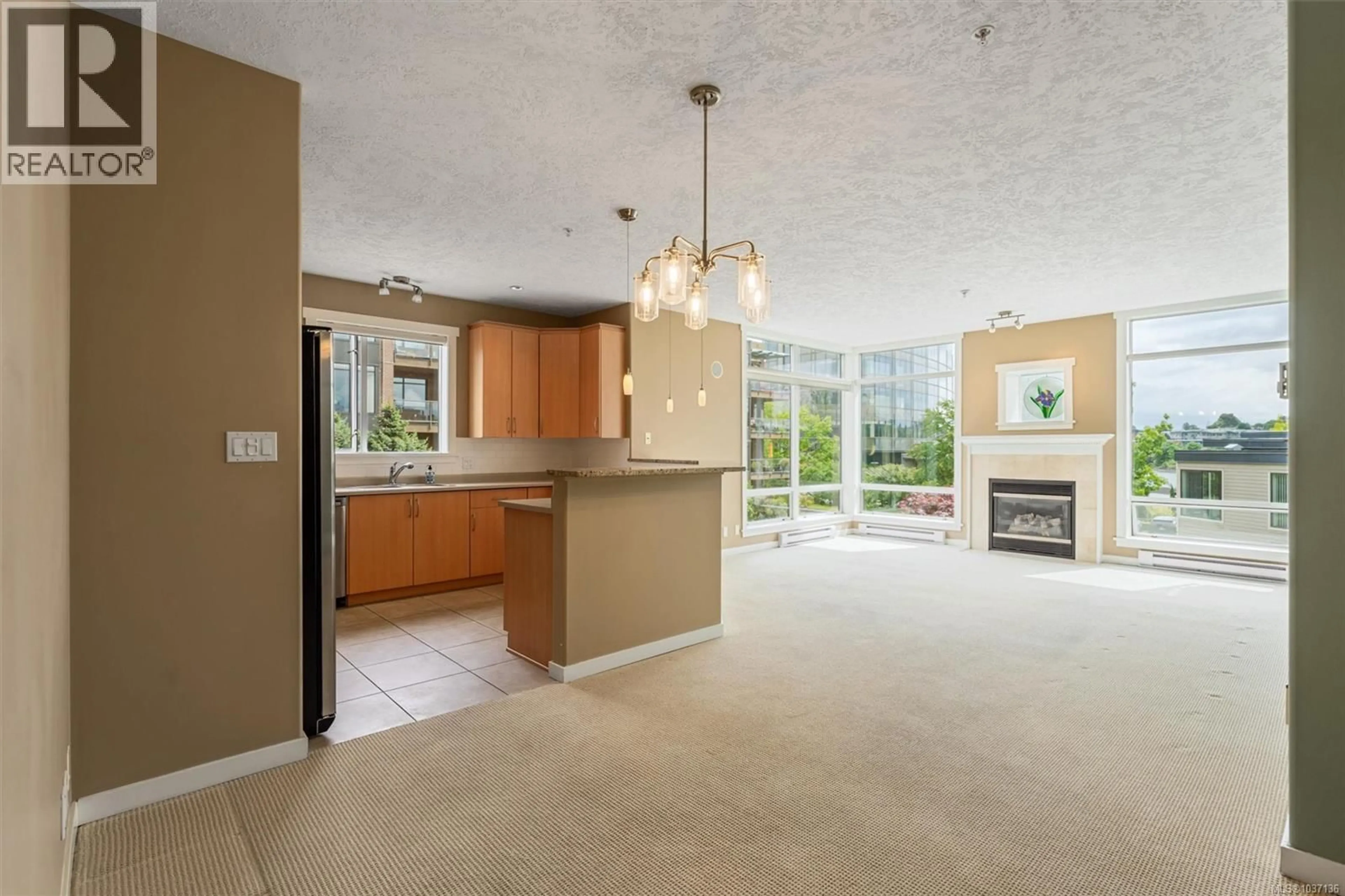 Open concept kitchen, ceramic/tile floor for 207 - 330 WATERFRONT CRESCENT, Victoria British Columbia V8T5K3
