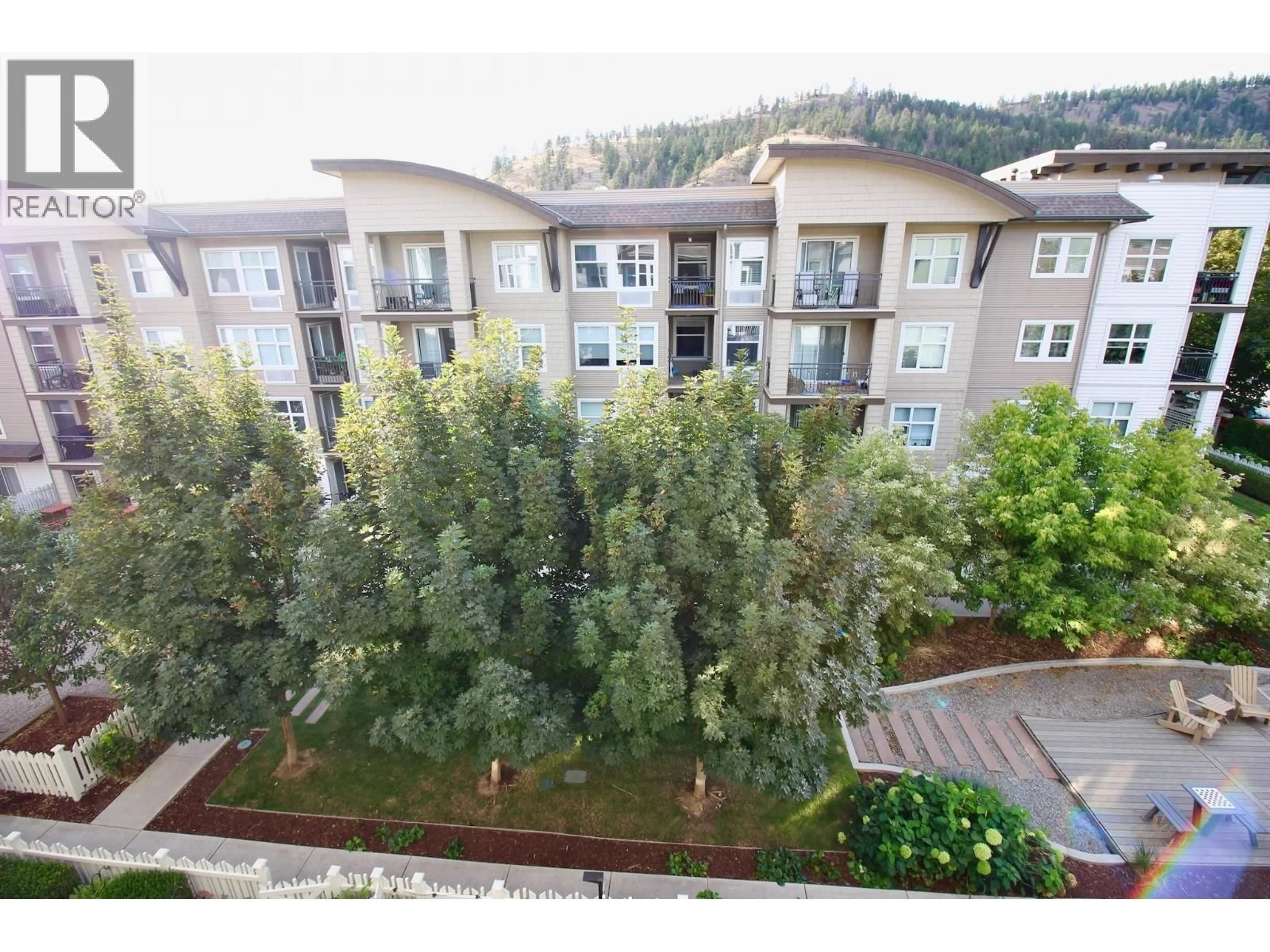 A pic from outside/outdoor area/front of a property/back of a property/a pic from drone, mountain view for 411 - 539 YATES ROAD, Kelowna British Columbia V1V2T8