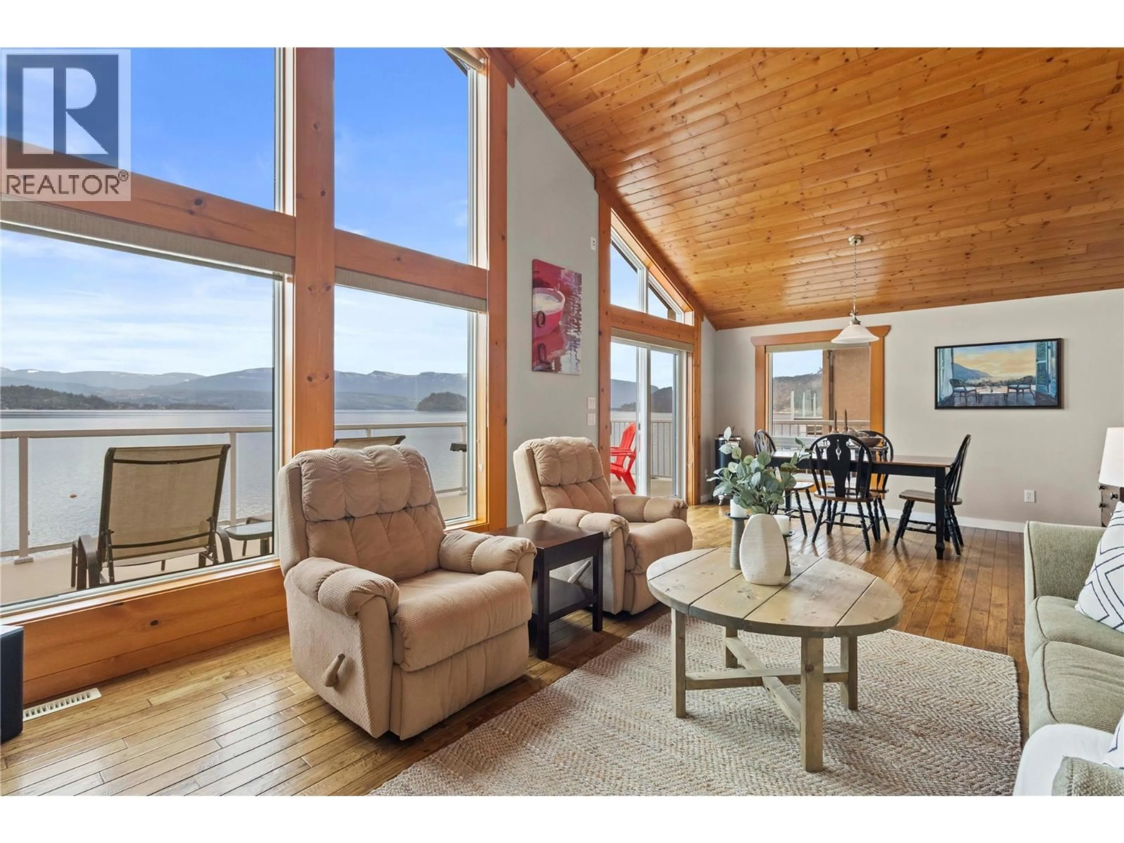 Living room with furniture, wood/laminate floor for 5106 SQUILAX ANGLEMONT ROAD, Celista British Columbia V0E1M6