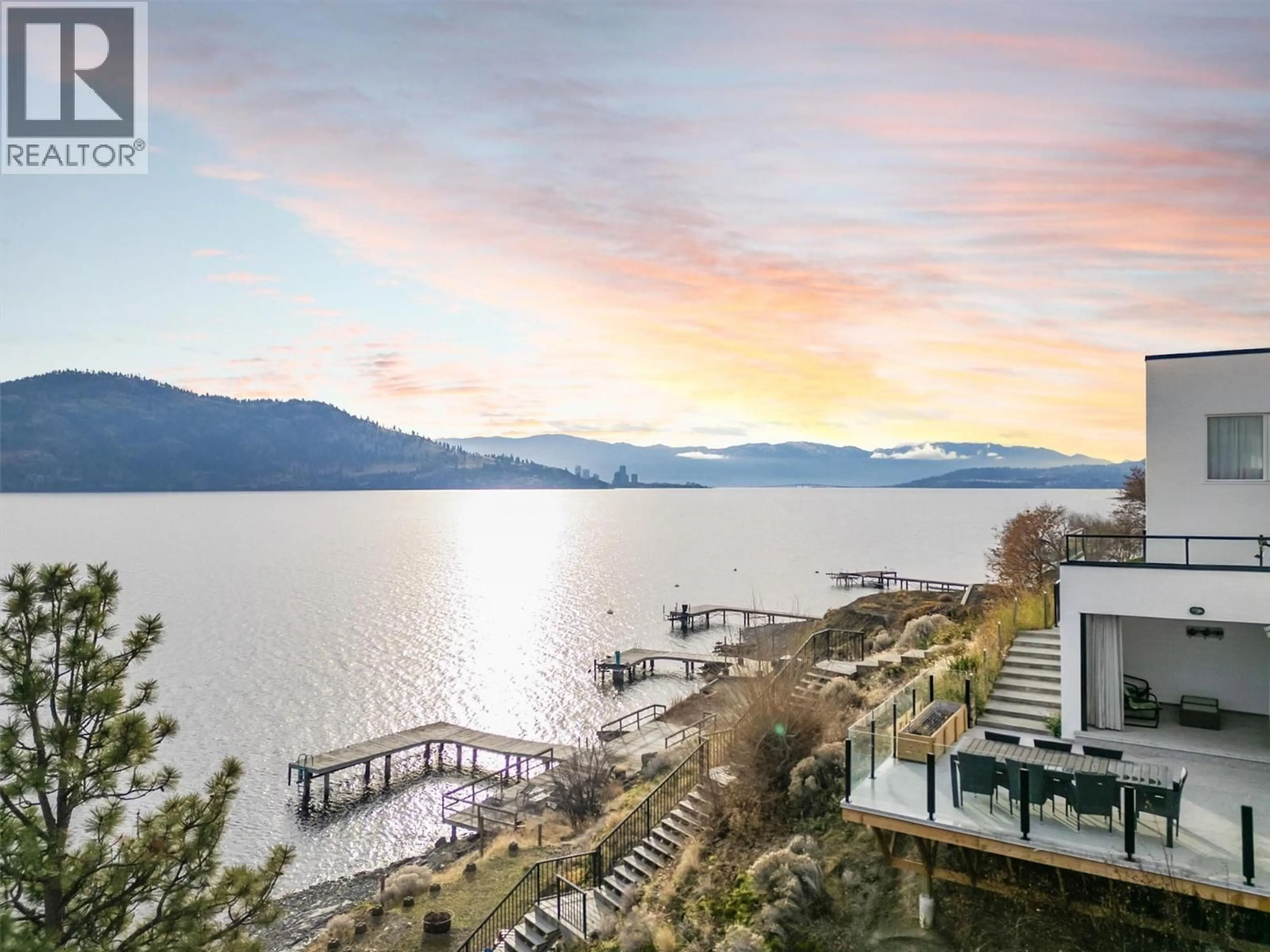 A pic from outside/outdoor area/front of a property/back of a property/a pic from drone, water/lake/river/ocean view for 15 TRADERS COVE ROAD, Kelowna British Columbia V1Z3S3