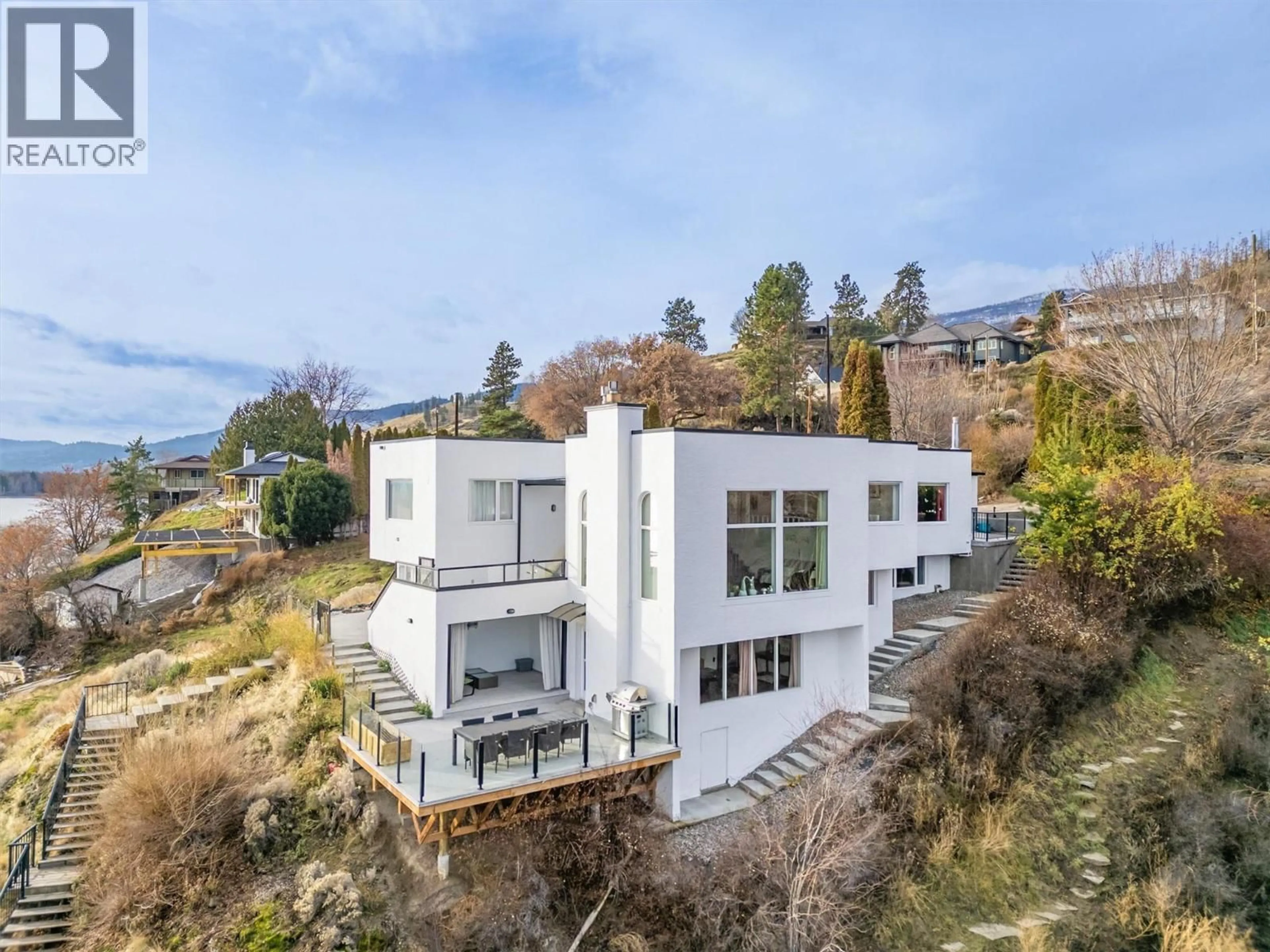 A pic from outside/outdoor area/front of a property/back of a property/a pic from drone, unknown for 15 TRADERS COVE ROAD, Kelowna British Columbia V1Z3S3