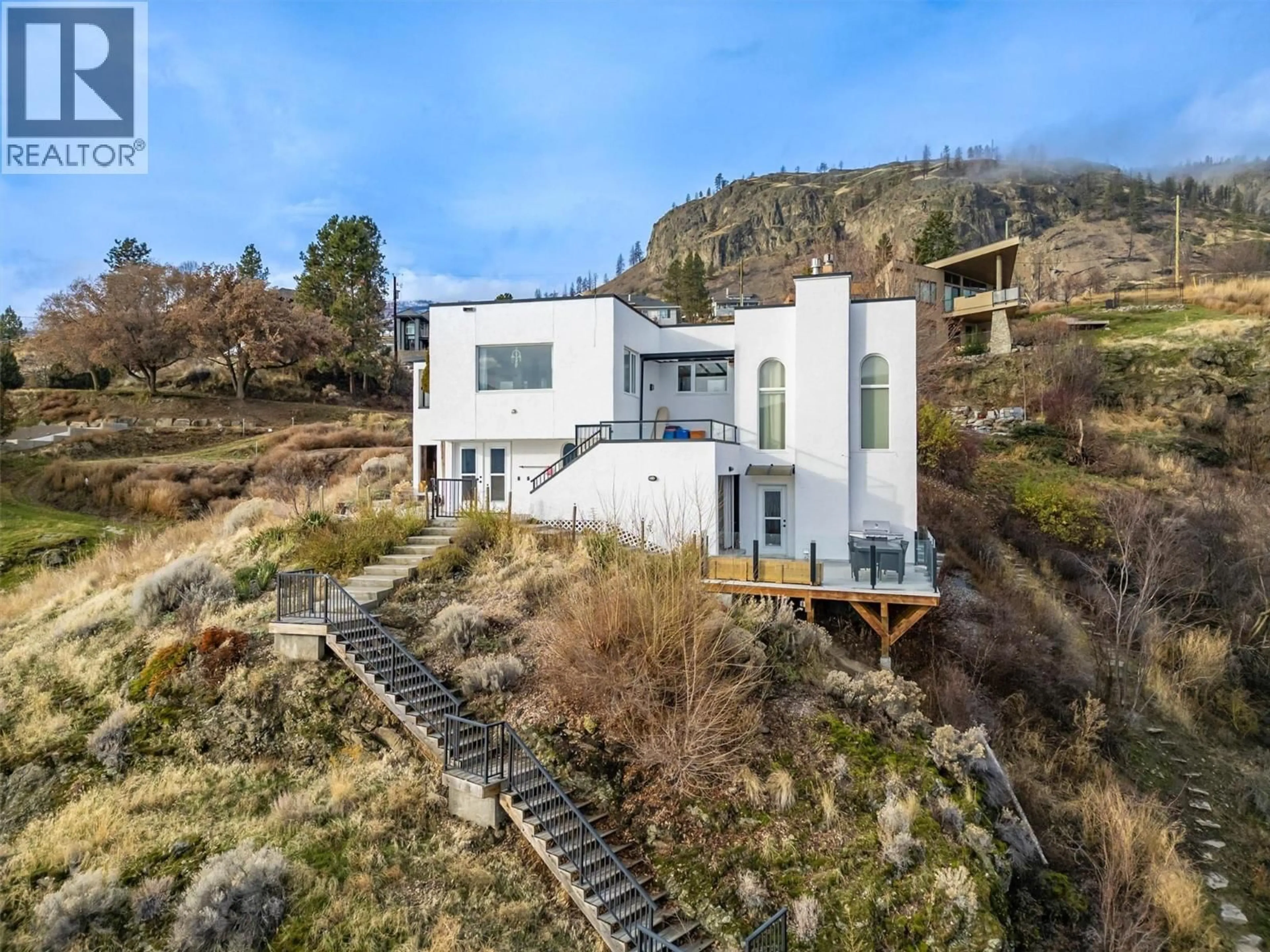 A pic from outside/outdoor area/front of a property/back of a property/a pic from drone, unknown for 15 TRADERS COVE ROAD, Kelowna British Columbia V1Z3S3