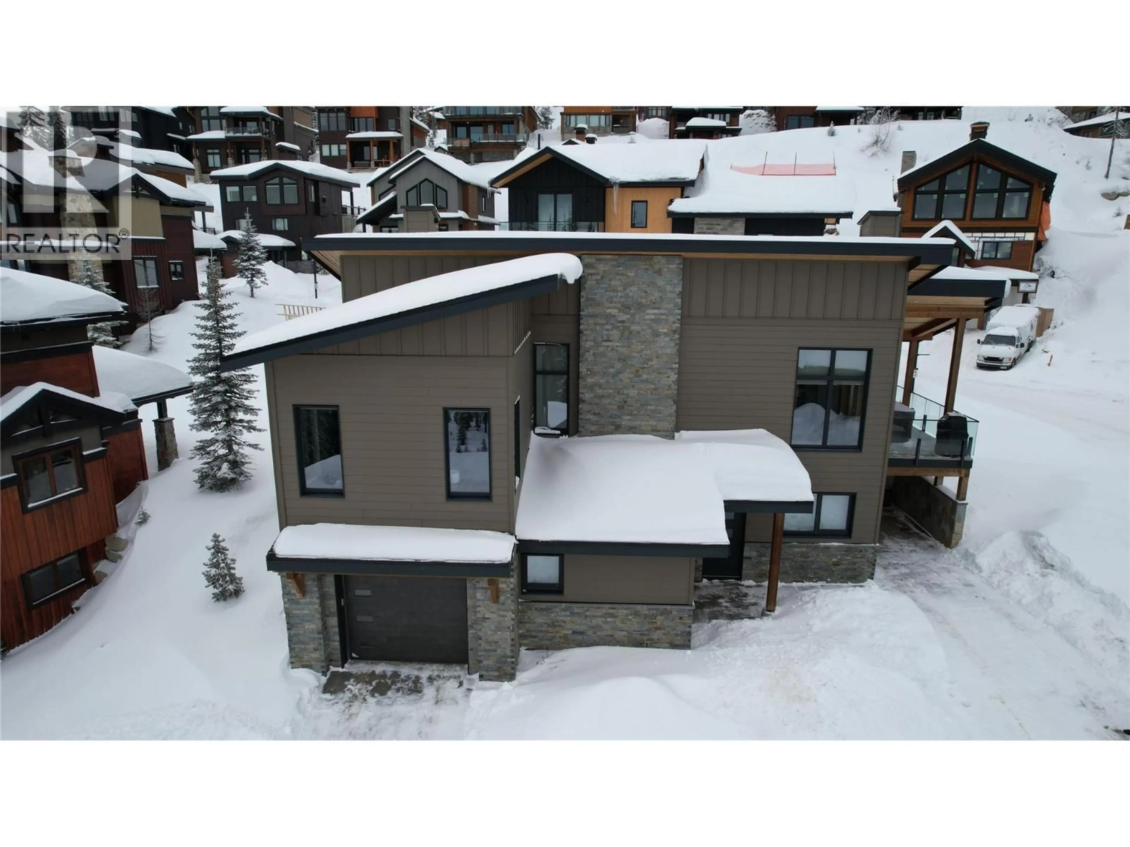 A pic from outside/outdoor area/front of a property/back of a property/a pic from drone, unknown for 375 FEATHERTOP WAY, Big White British Columbia V1P1T4