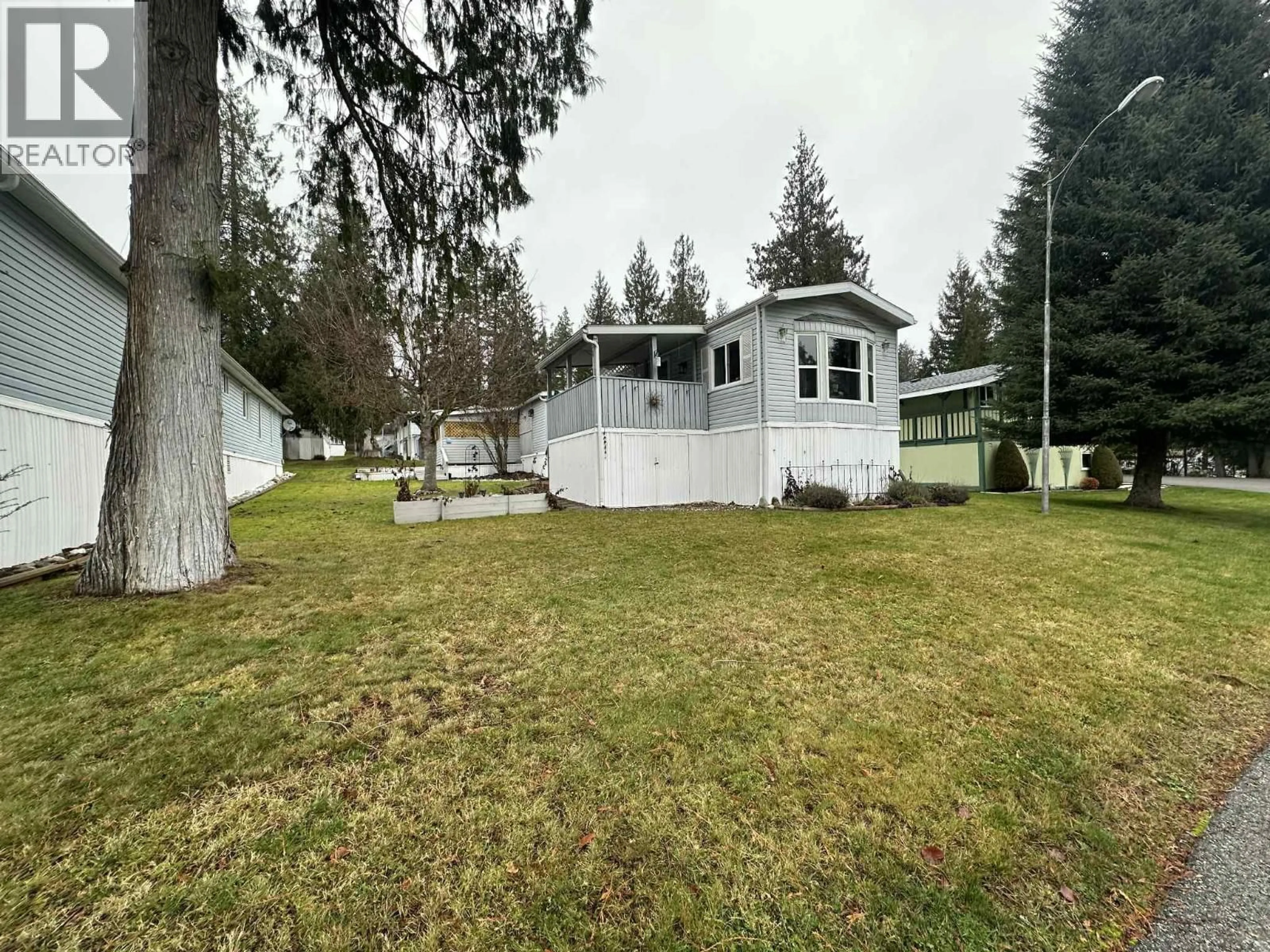 A pic from outside/outdoor area/front of a property/back of a property/a pic from drone, water/lake/river/ocean view for 20 - 7126 HIGHWAY 3A OTHER, Nelson British Columbia V1L6S3