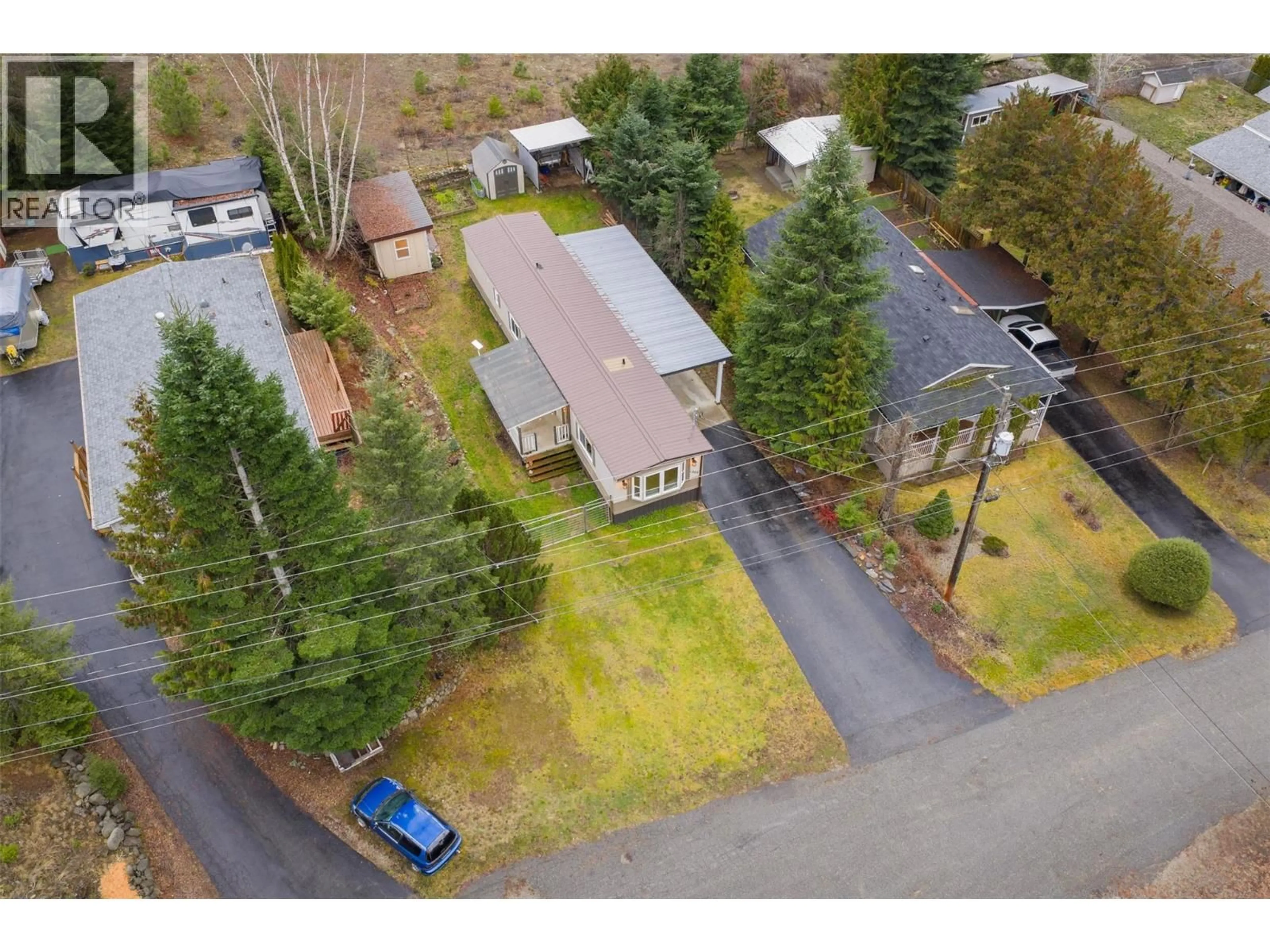 A pic from outside/outdoor area/front of a property/back of a property/a pic from drone, street for 1005 GARDEN ROAD, South Slocan British Columbia V0G2G1