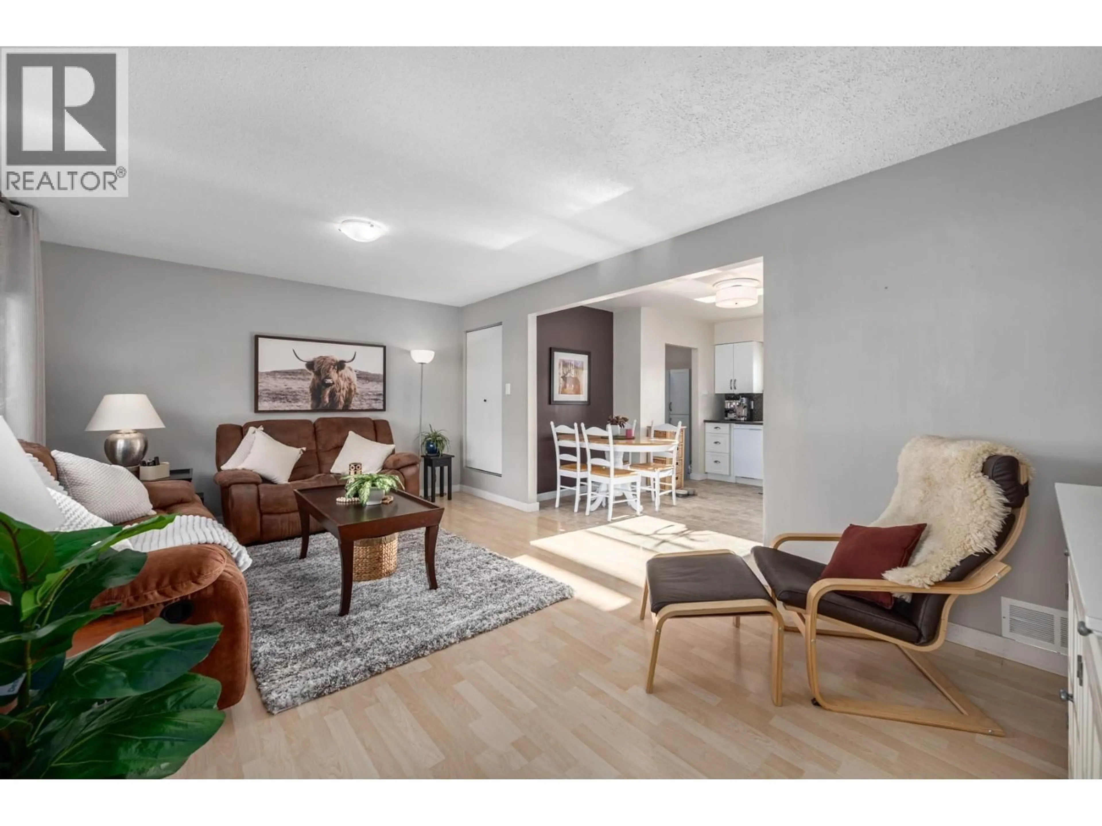 Living room with furniture, wood/laminate floor for 705 ELM STREET, Ashcroft British Columbia V0K1A0