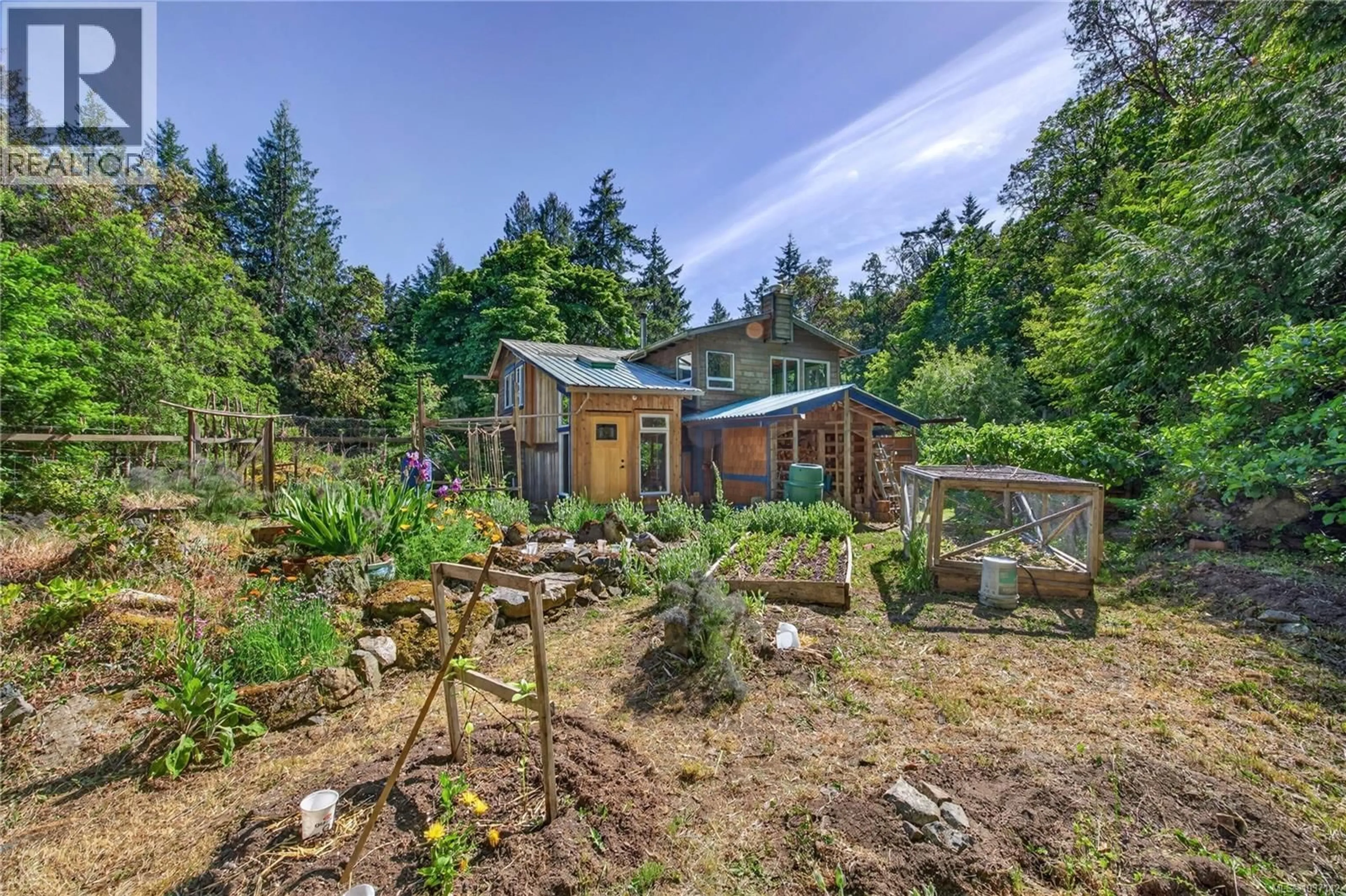 A pic from outside/outdoor area/front of a property/back of a property/a pic from drone, unknown for 1252 ISABELLA POINT ROAD, Salt Spring British Columbia V8K2T9